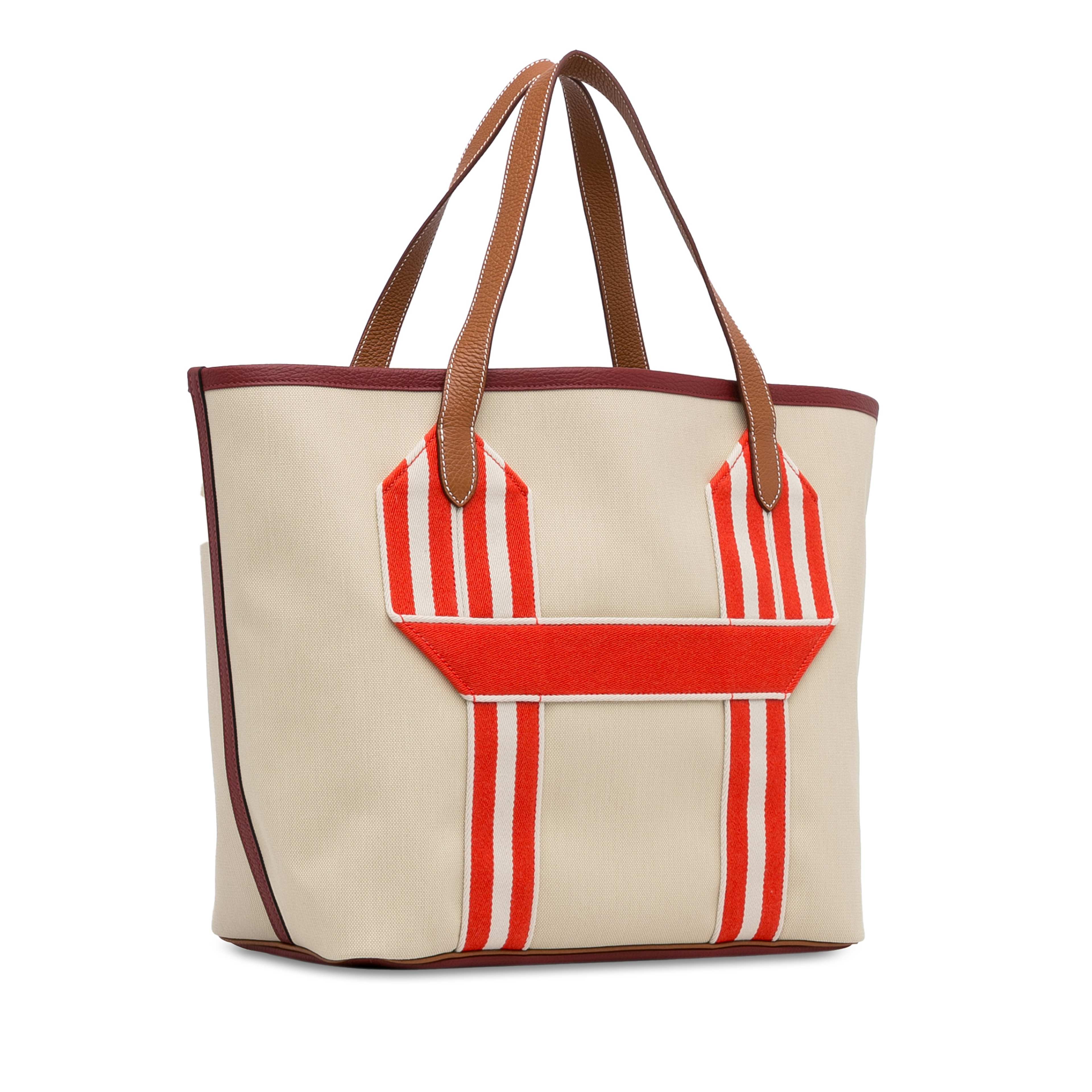 Hermès Canvas Pursangle Tote, från Luxclusif, i färgen beige. Klicka för att öppna bilden i stort format