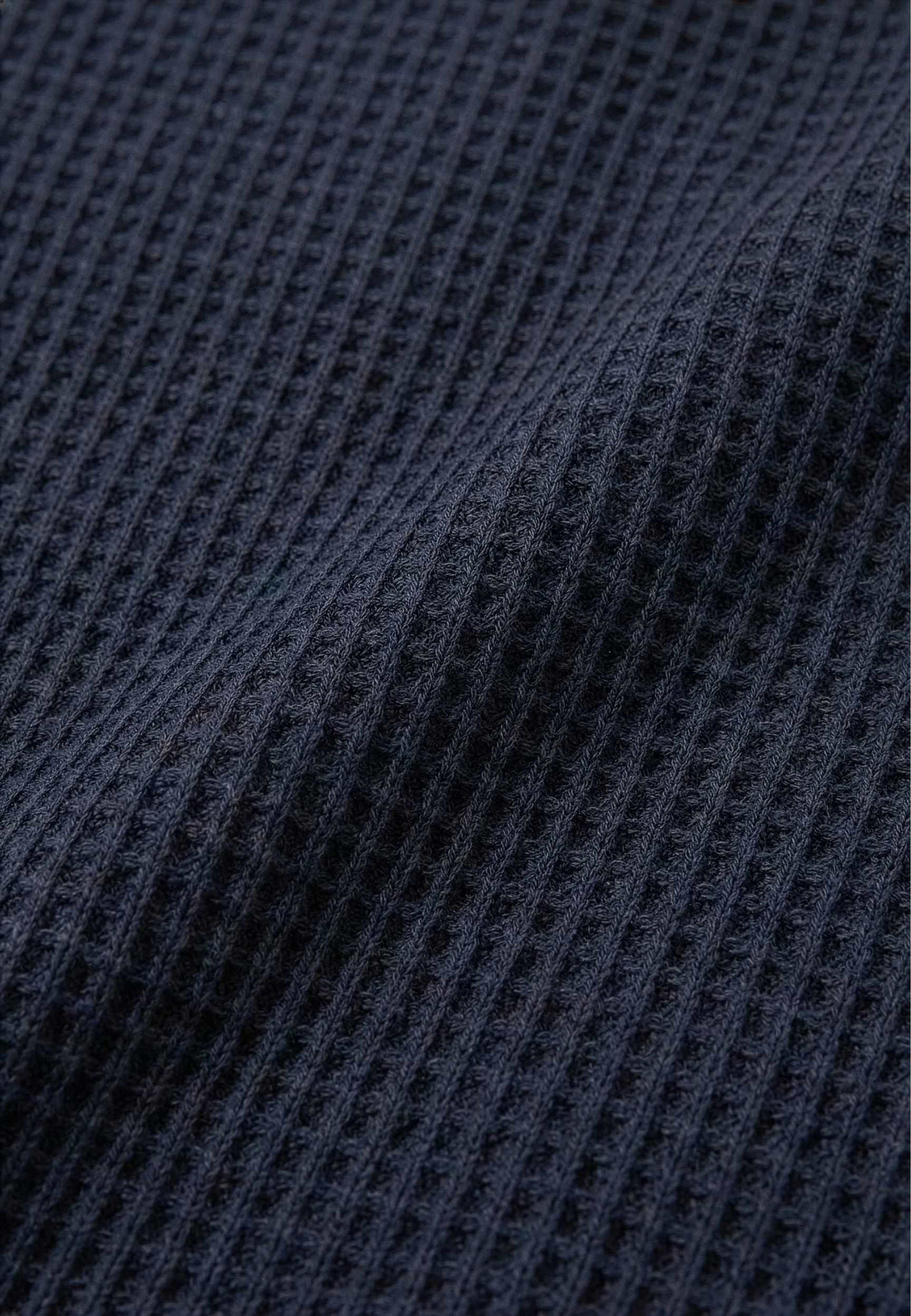 Nelson Knitted Polo - Black, från Ciszere, i färgen black. Klicka för att öppna bilden i stort format