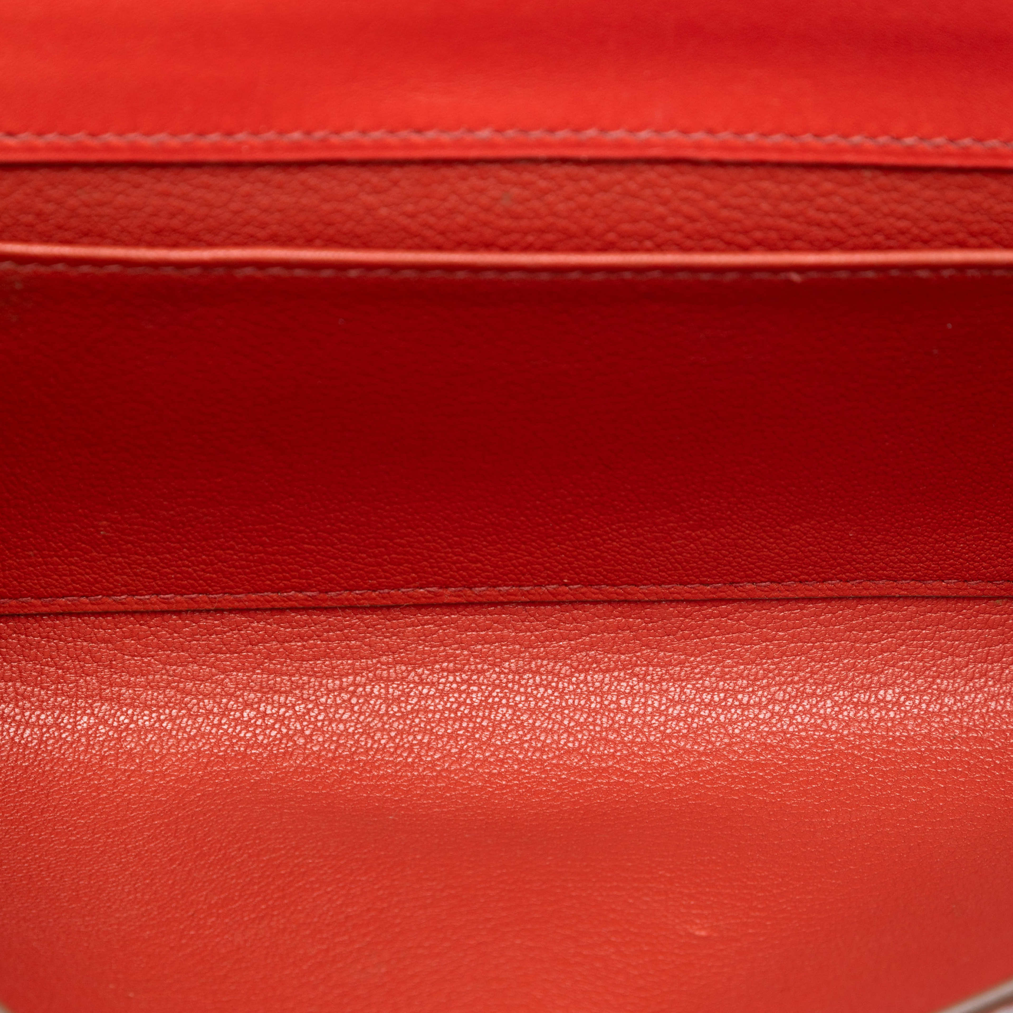 Hermès Toile Herbag Zip 39, från Luxclusif, i färgen röd. Klicka för att öppna bilden i stort format