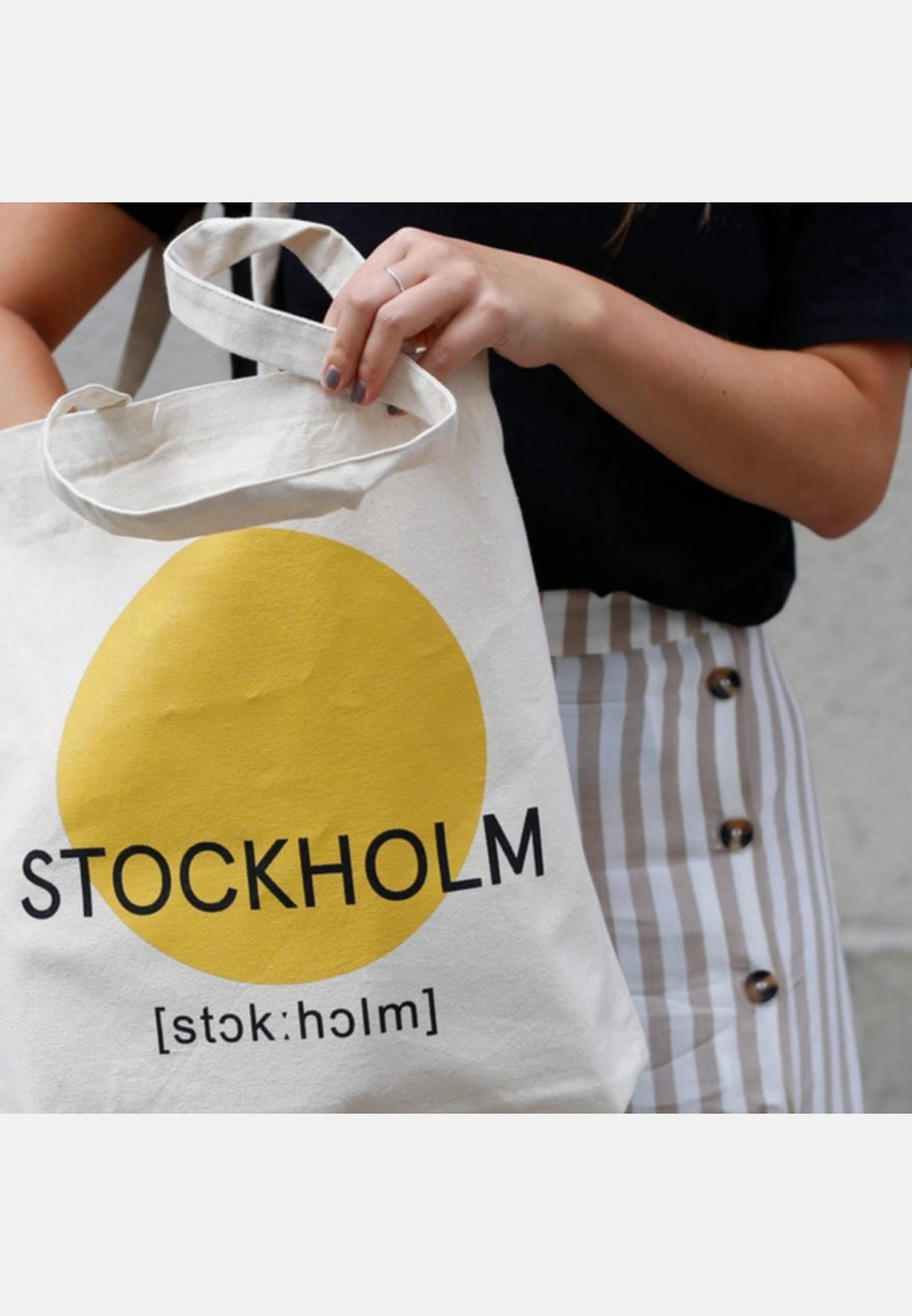Totebag Sthlm, från Atelier by Designtorget, i färgen gul. Klicka för att öppna bilden i stort format