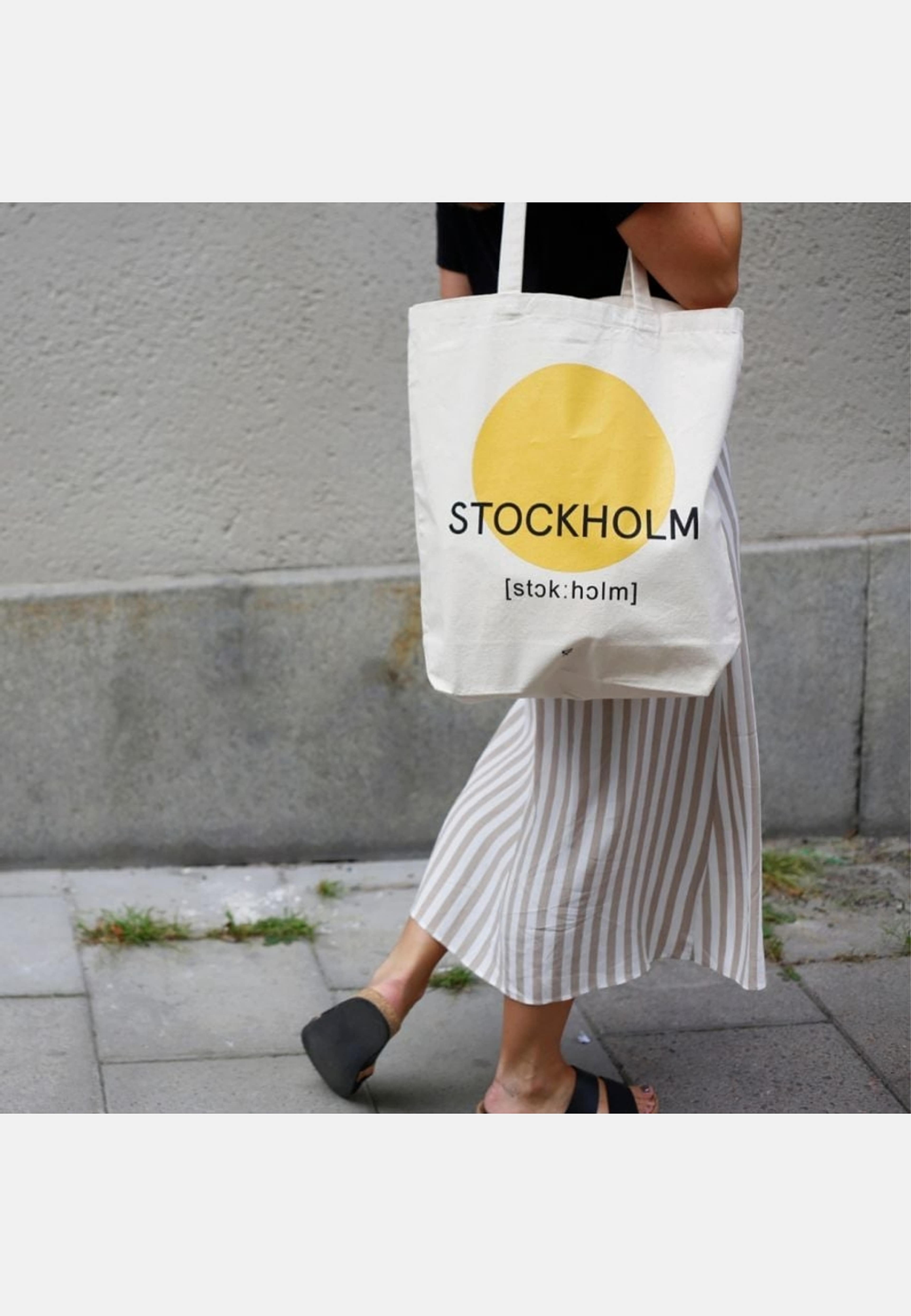 Totebag Sthlm, från Atelier by Designtorget, i färgen gul. Klicka för att öppna bilden i stort format