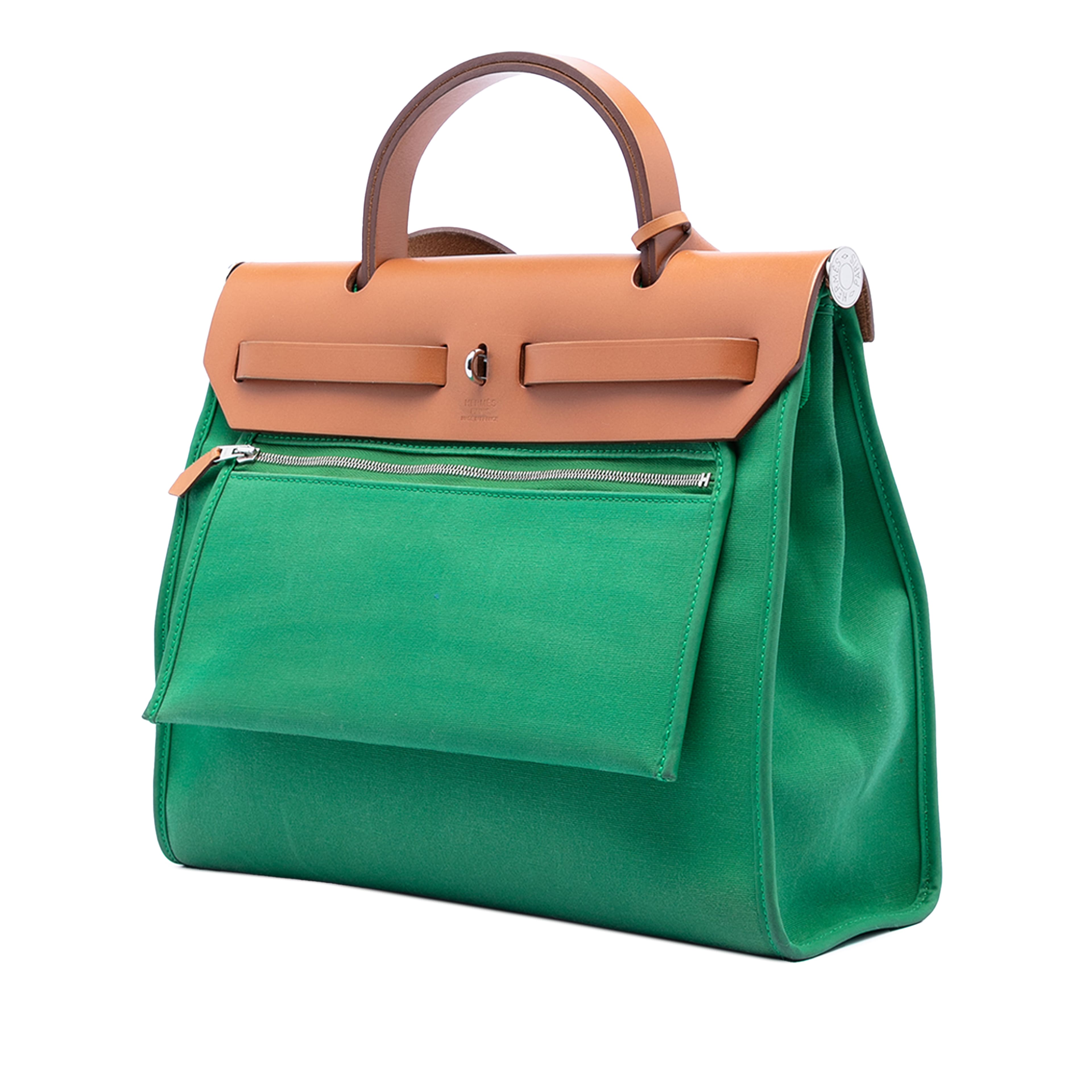 Hermès Toile Herbag Zip 31, från Luxclusif, i färgen green. Klicka för att öppna bilden i stort format