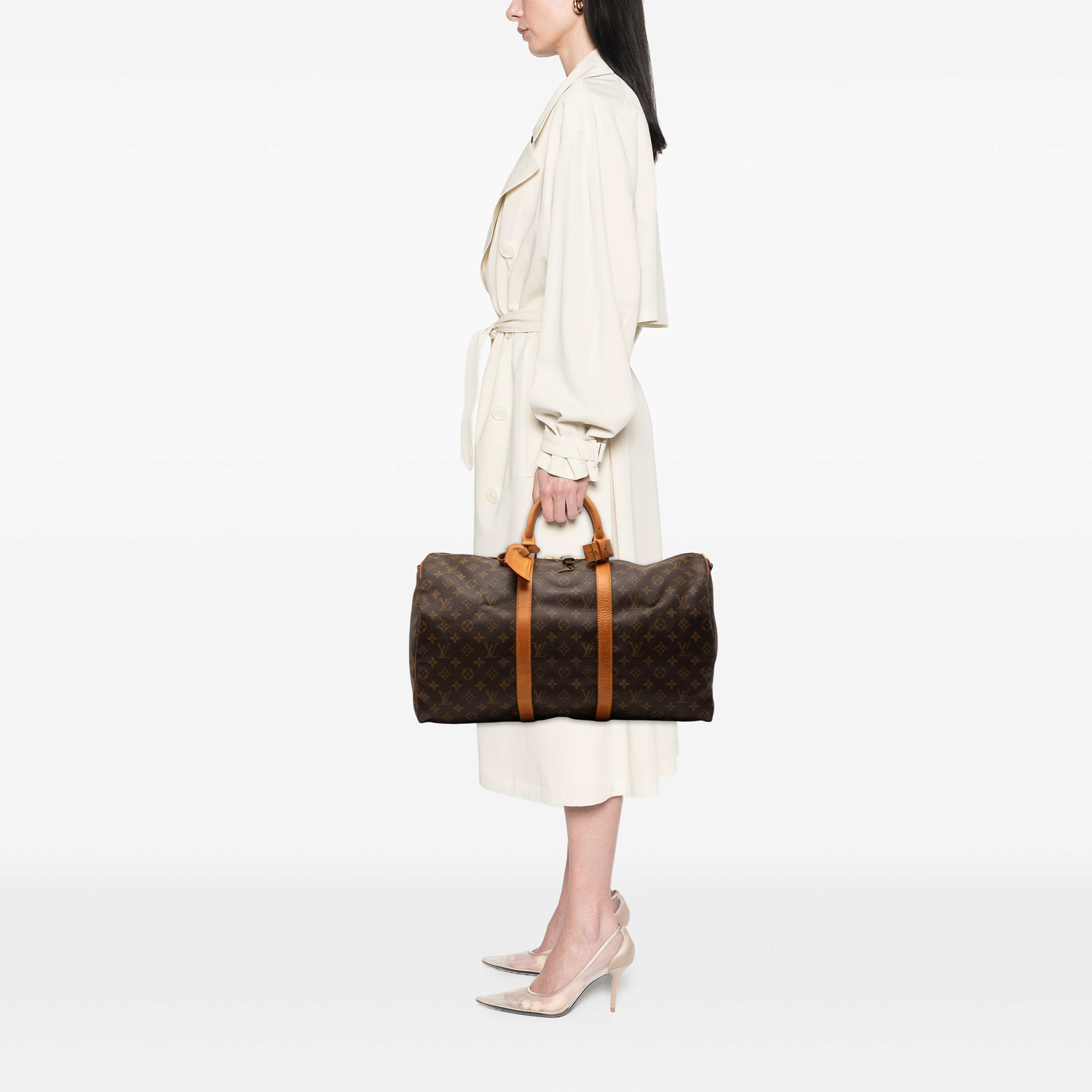 Louis Vuitton Monogram Keepall Bandouliere 50, från Luxclusif, i färgen brun. Klicka för att öppna bilden i stort format