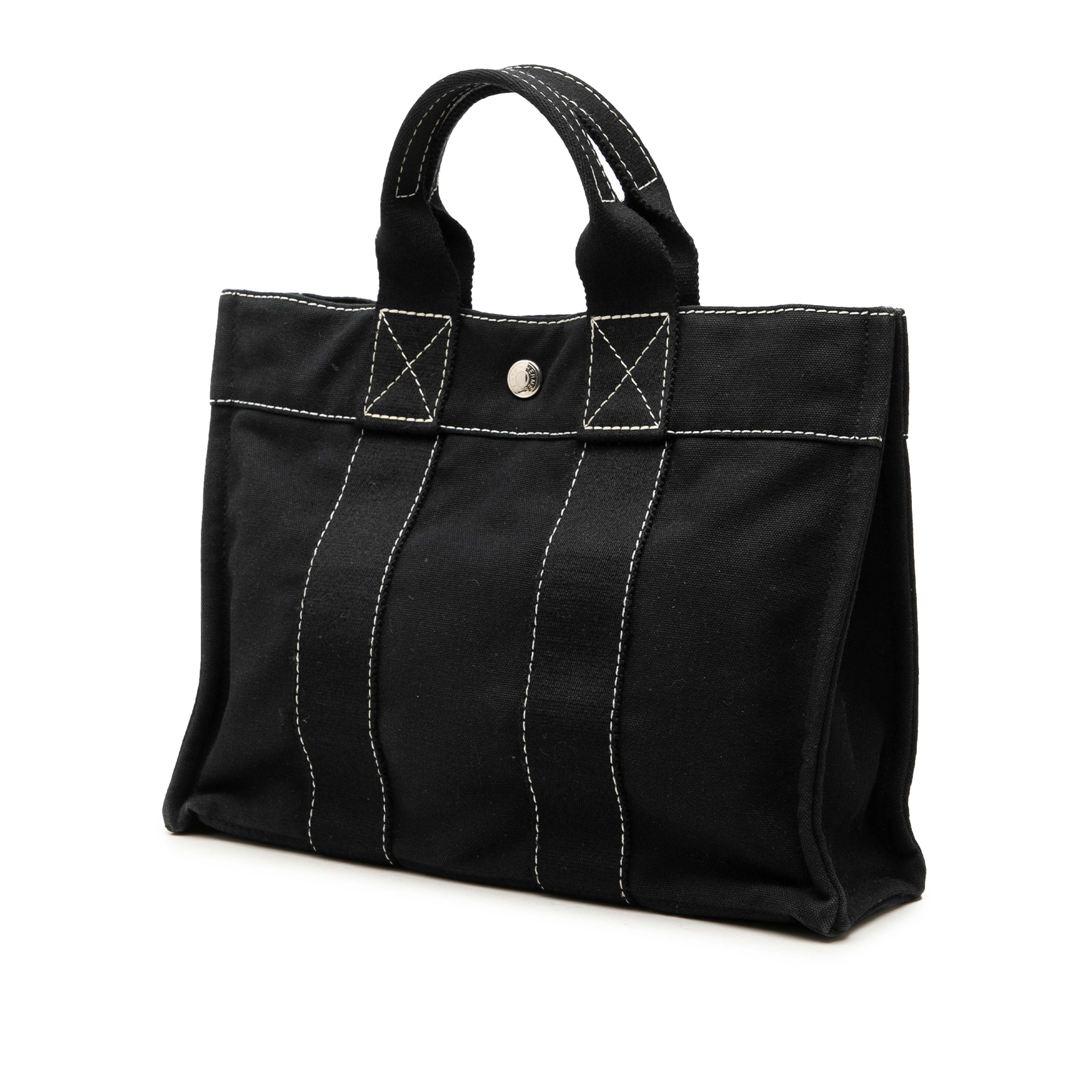 Hermès Canvas Fourre Tout Pm, från Luxclusif, i färgen svart. Klicka för att öppna bilden i stort format