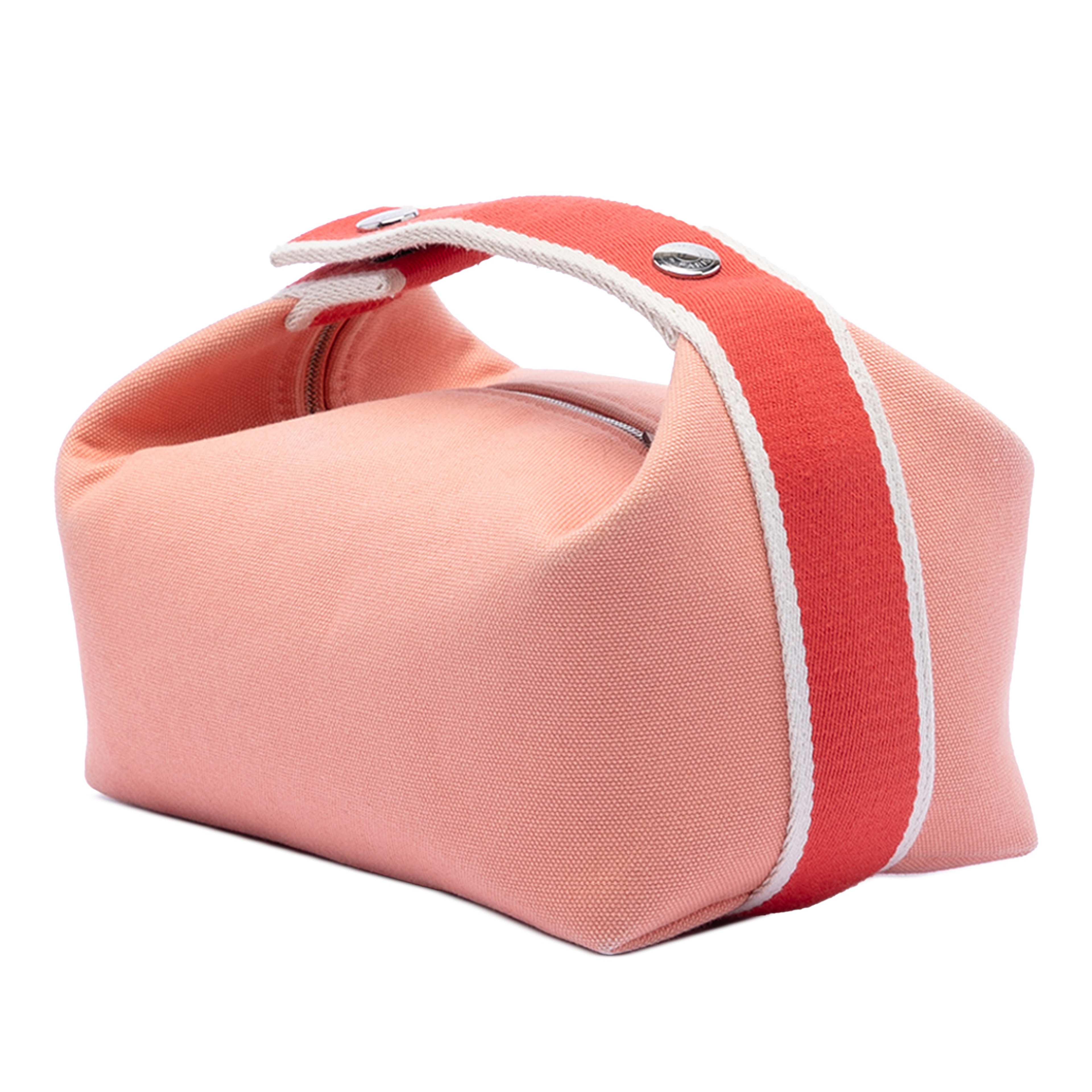 Hermès Small Toile Bride A Brac Case, från Luxclusif, i färgen peach. Klicka för att öppna bilden i stort format