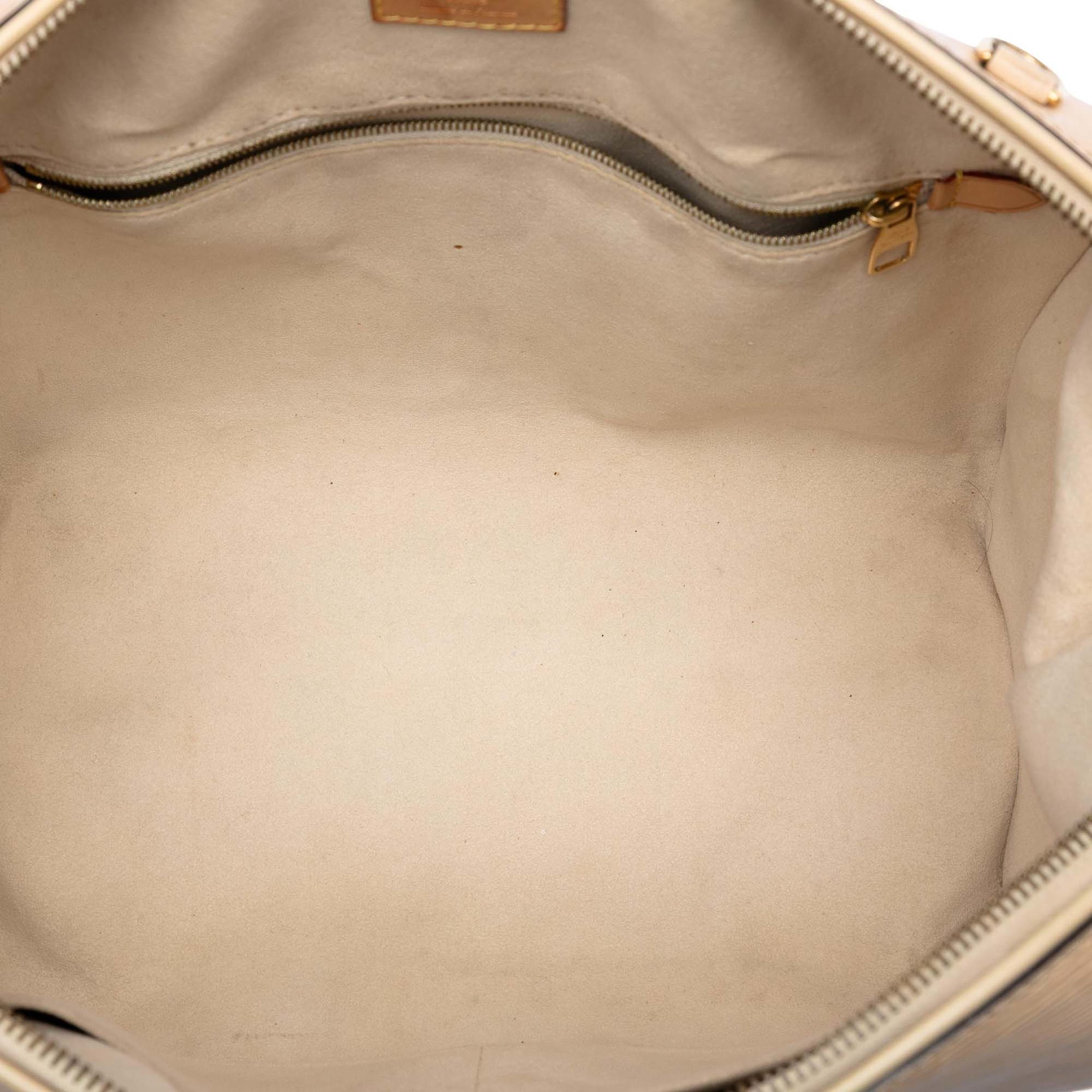 Louis Vuitton Epi Doc Pm, från Luxclusif, i färgen beige. Klicka för att öppna bilden i stort format