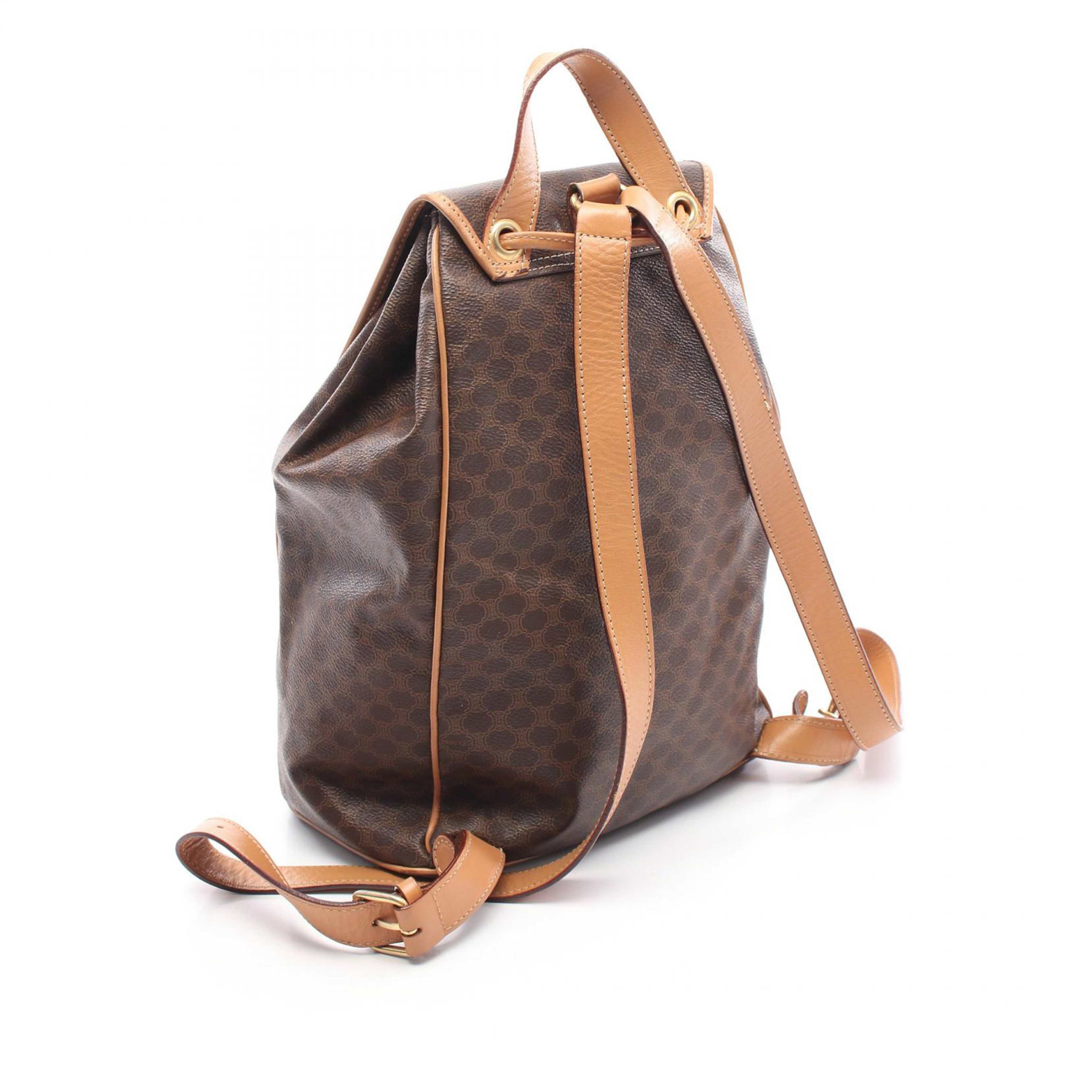Celine Macadam Coated Canvas Backpack, från Luxclusif, i färgen brown.