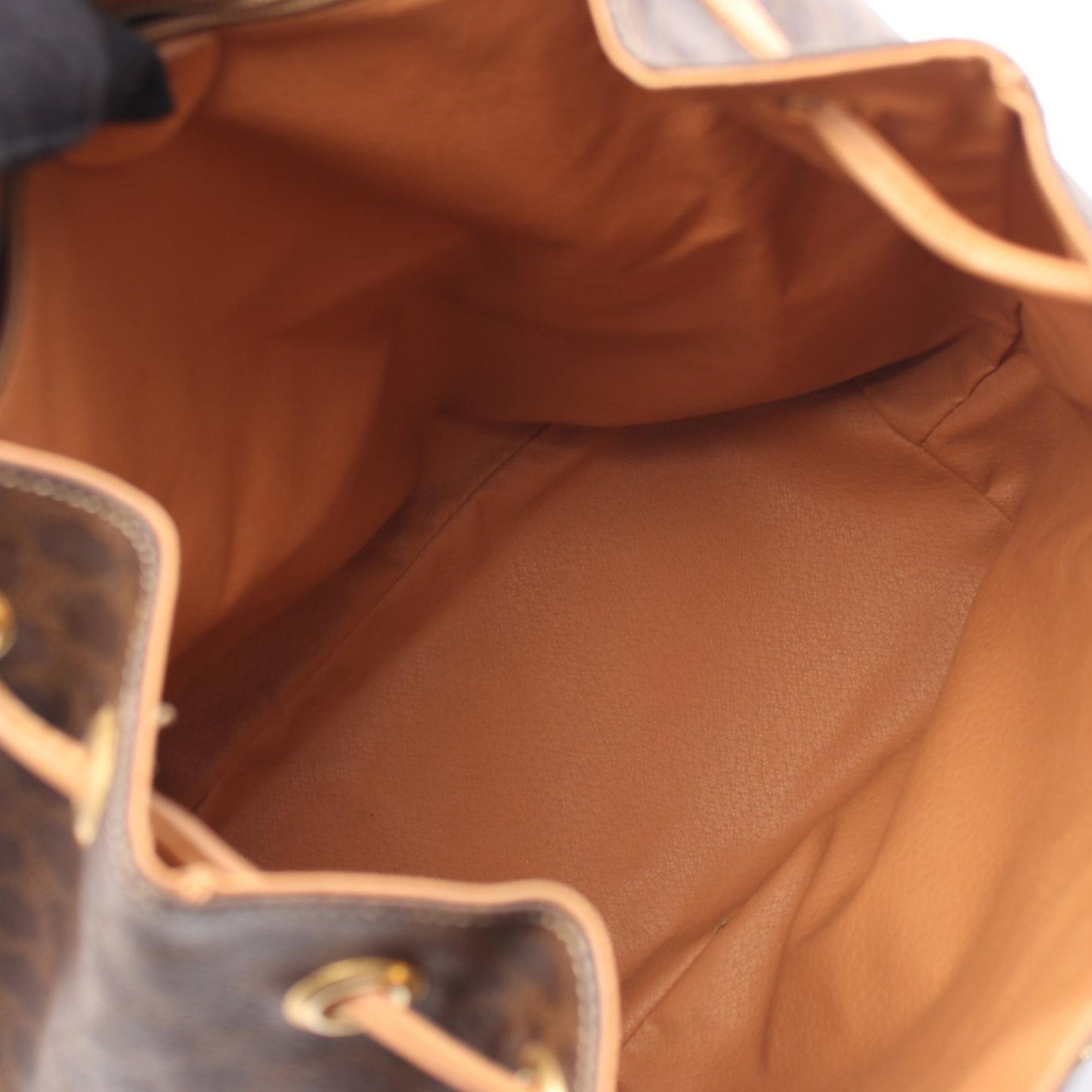 Celine Macadam Coated Canvas Backpack, från Luxclusif, i färgen brown.
