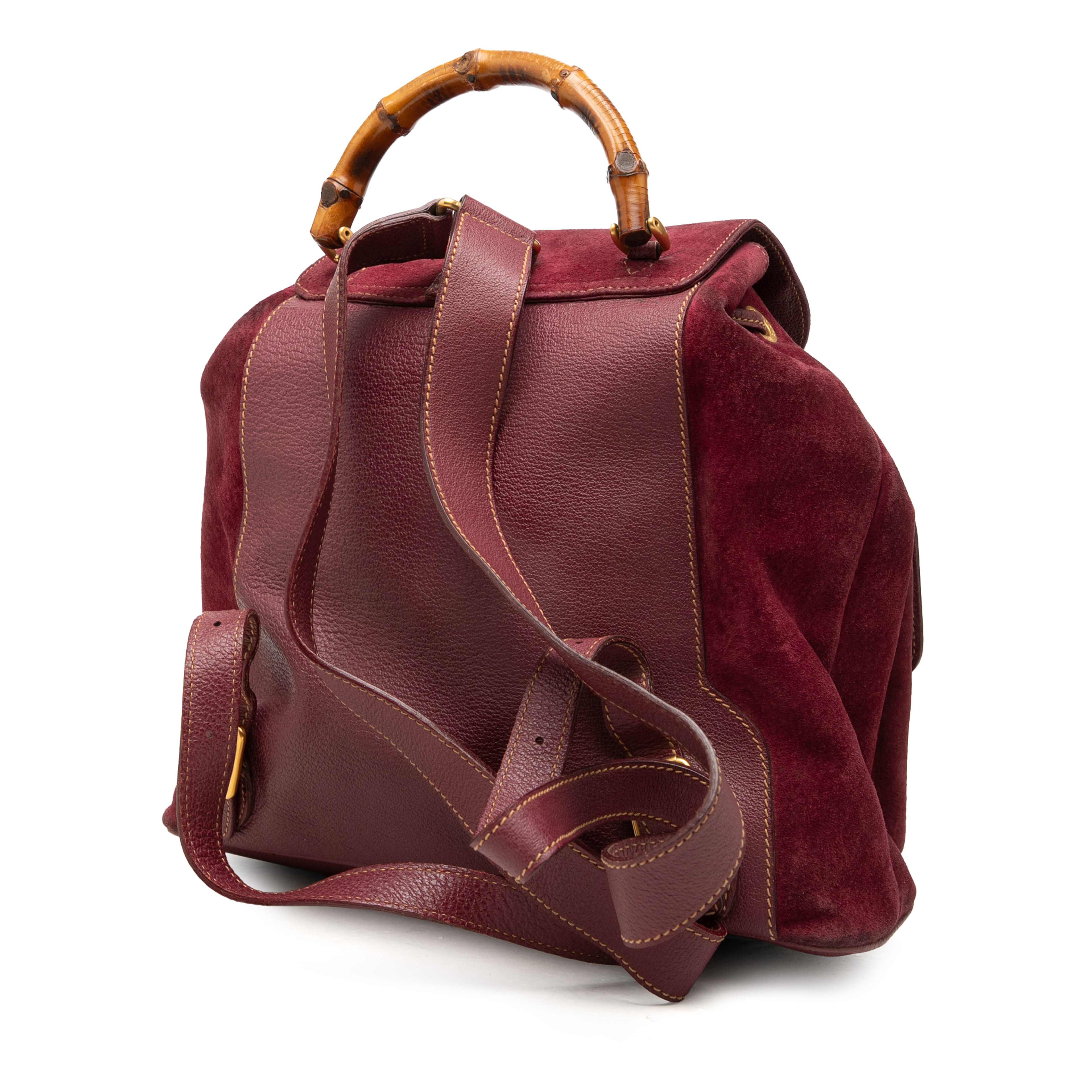 Gucci Large Suede Bamboo Drawstring Backpack, från Luxclusif, i färgen röd. Klicka för att öppna bilden i stort format