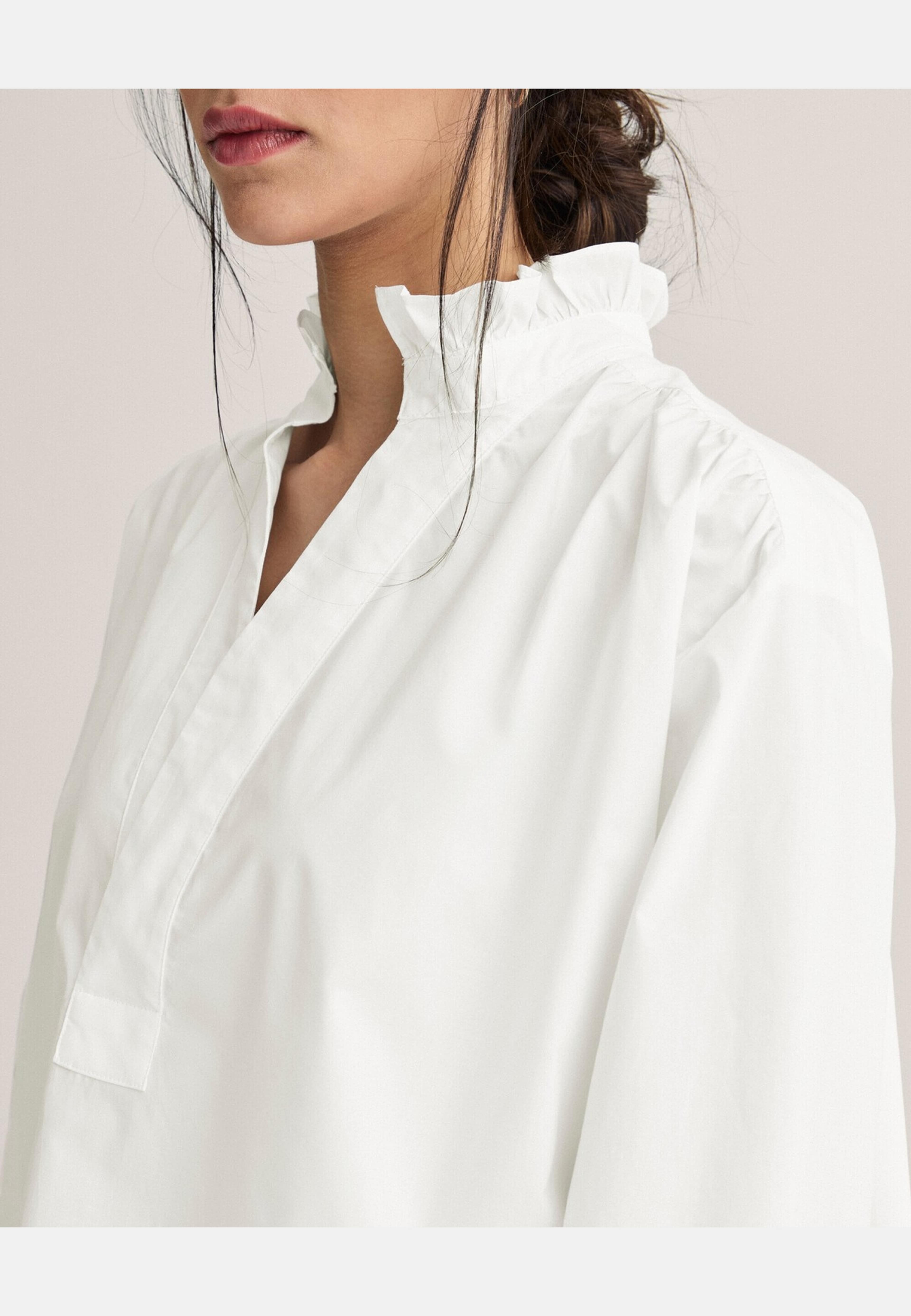 Blus Margaux, från Newhouse, i färgen vit. Klicka för att öppna bilden i stort format