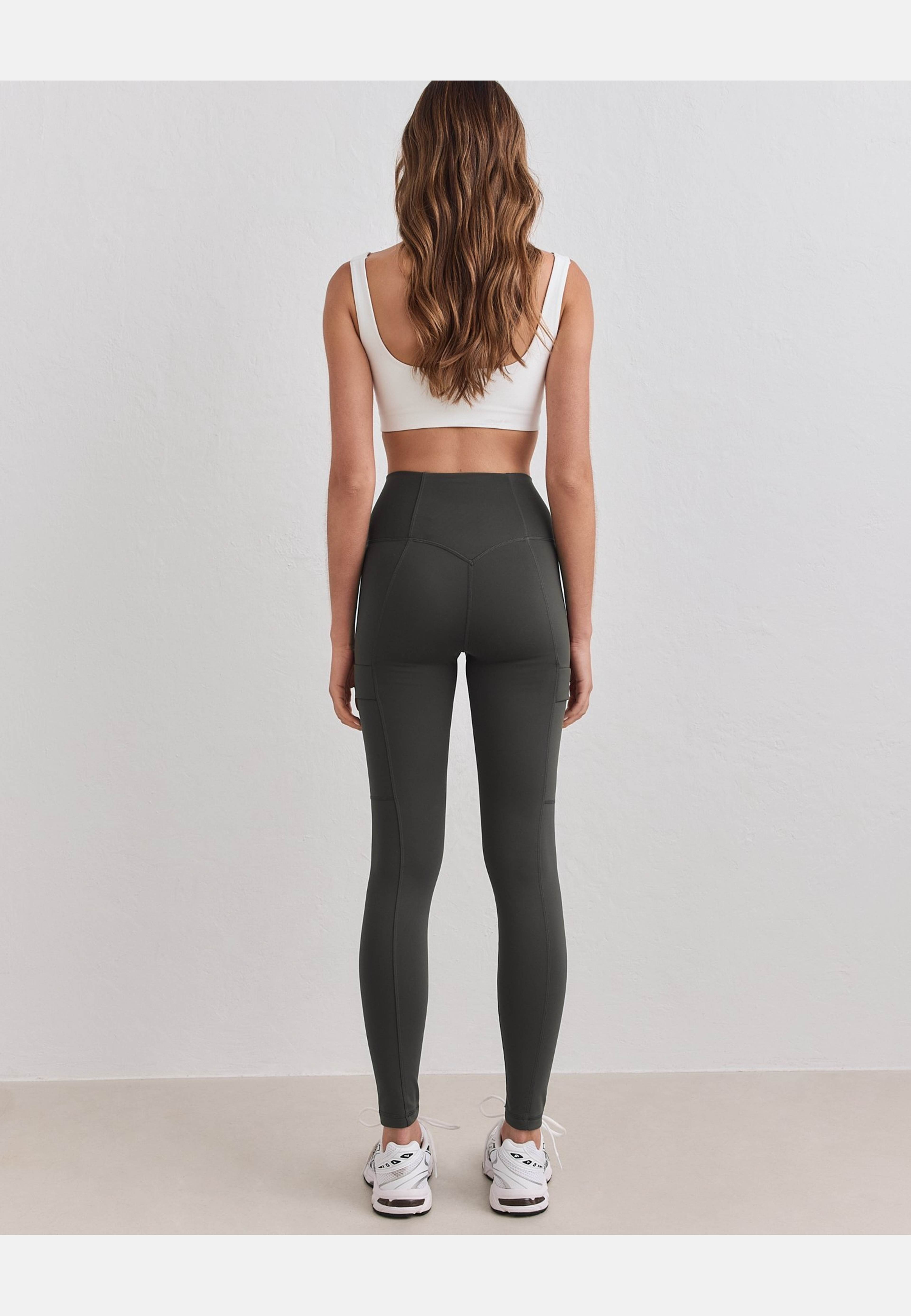 Warming Pocket Tights, från aim'n, i färgen dark ivy. Klicka för att öppna bilden i stort format
