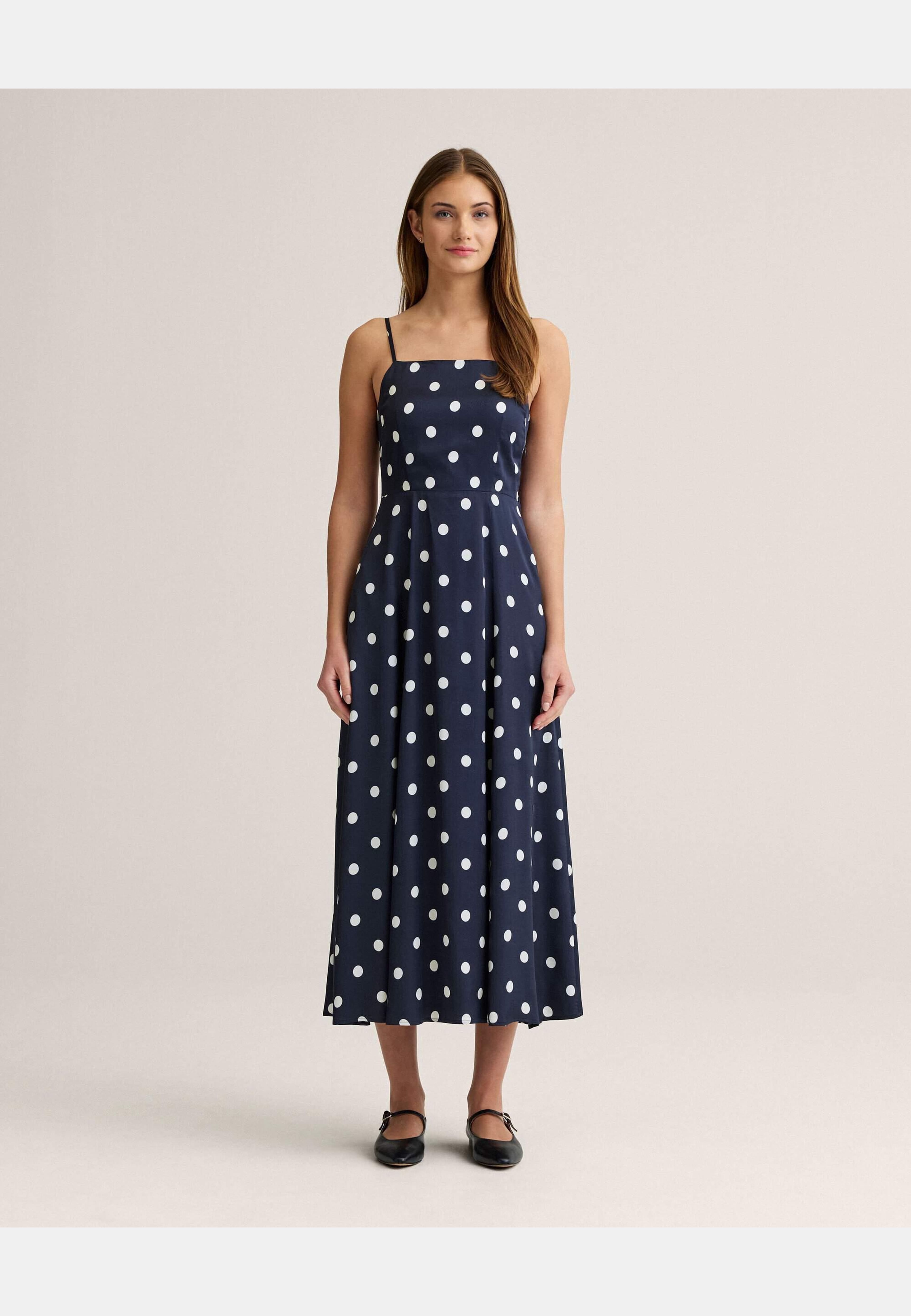 Beau Dot Dress, från Newhouse, i färgen marinblå. Klicka för att öppna bilden i stort format