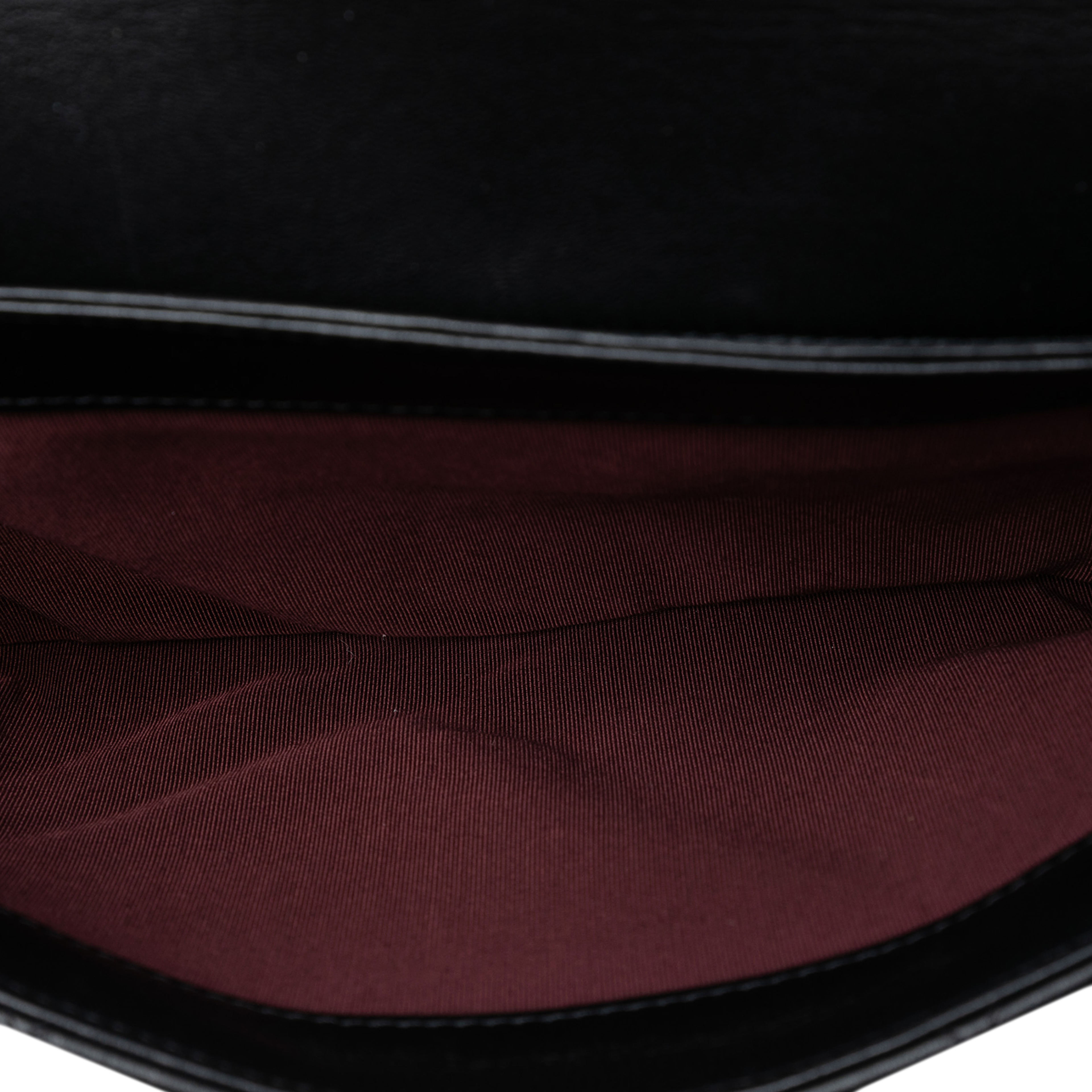 Chanel Quilted Lambskin Retro Label Shoulder Bag, från Luxclusif, i färgen black. Klicka för att öppna bilden i stort format