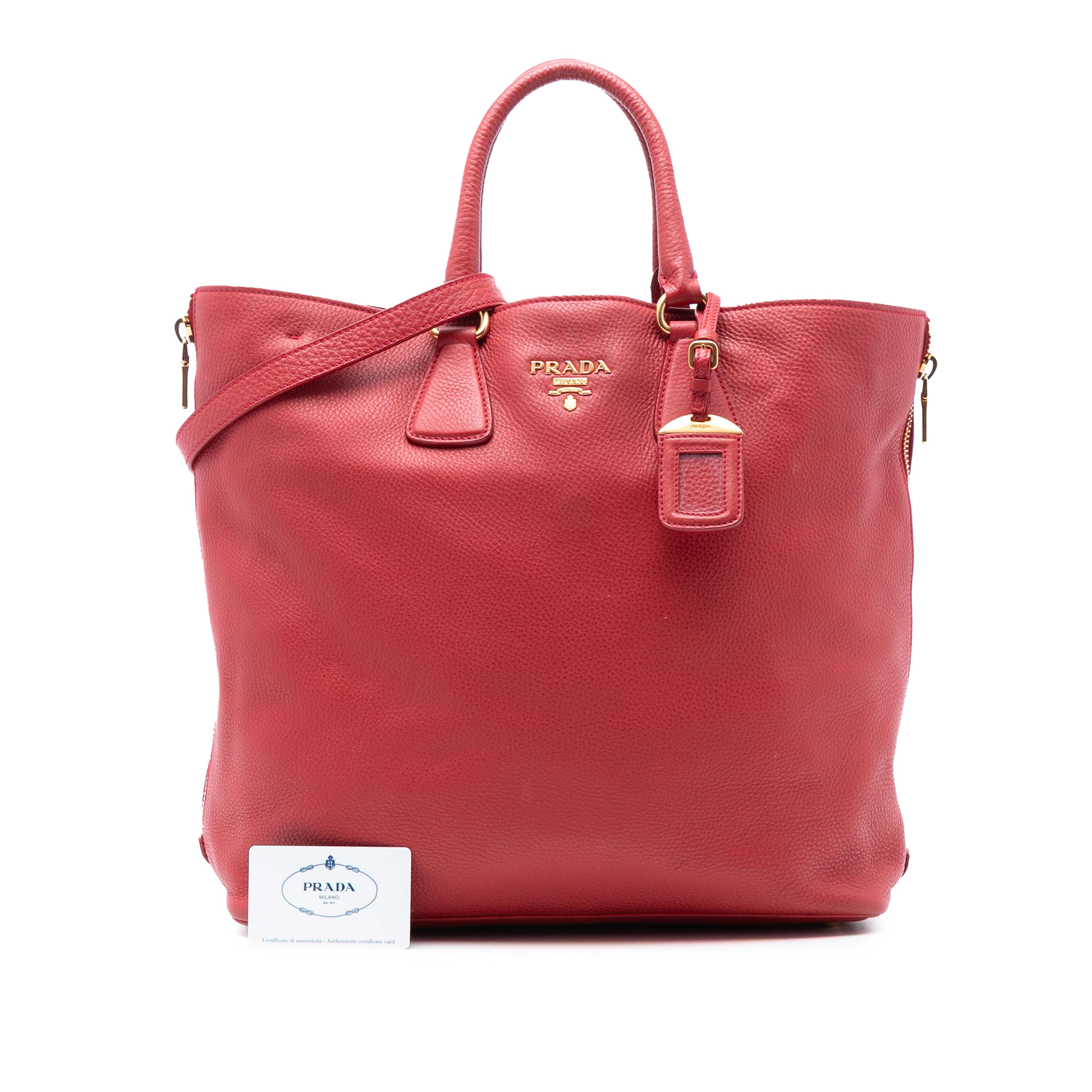 Prada Vitello Daino Side Zip Shopper Tote, från Luxclusif, i färgen röd. Klicka för att öppna bilden i stort format