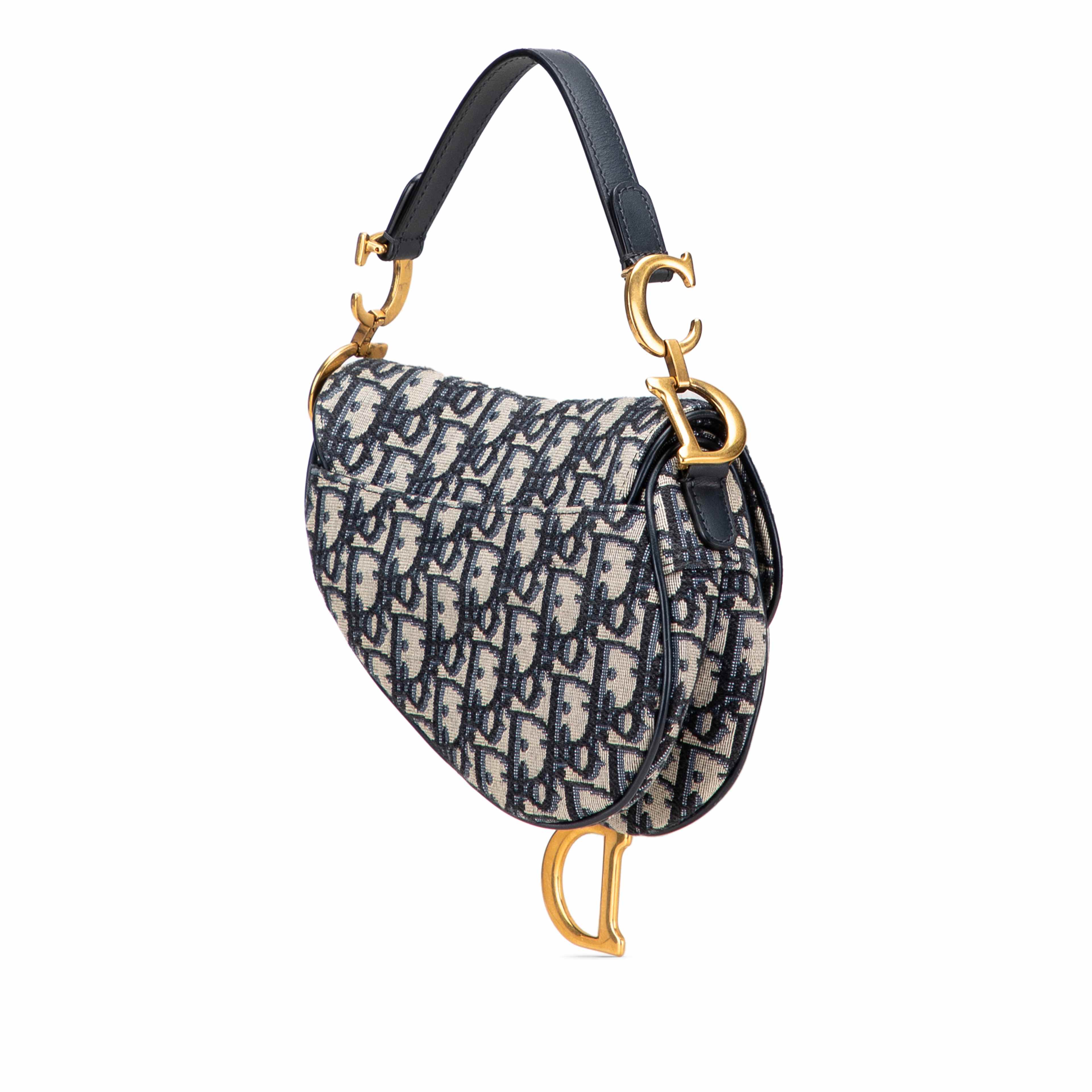 Dior Mini Oblique Canvas Saddle Bag, från Luxclusif, i färgen navy. Klicka för att öppna bilden i stort format