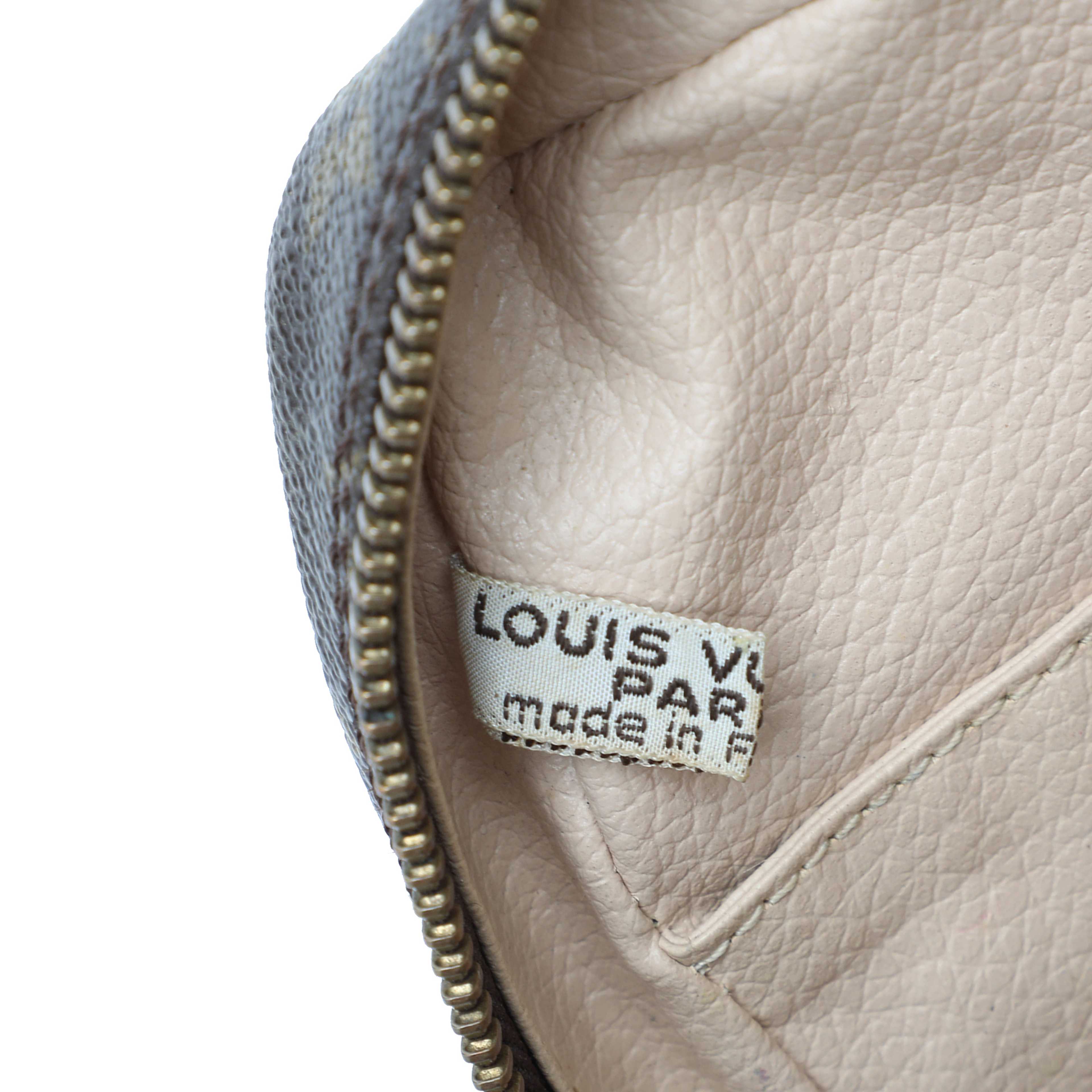 Louis Vuitton Monogram Trousse Toilette 23, från Luxclusif, i färgen brun. Klicka för att öppna bilden i stort format