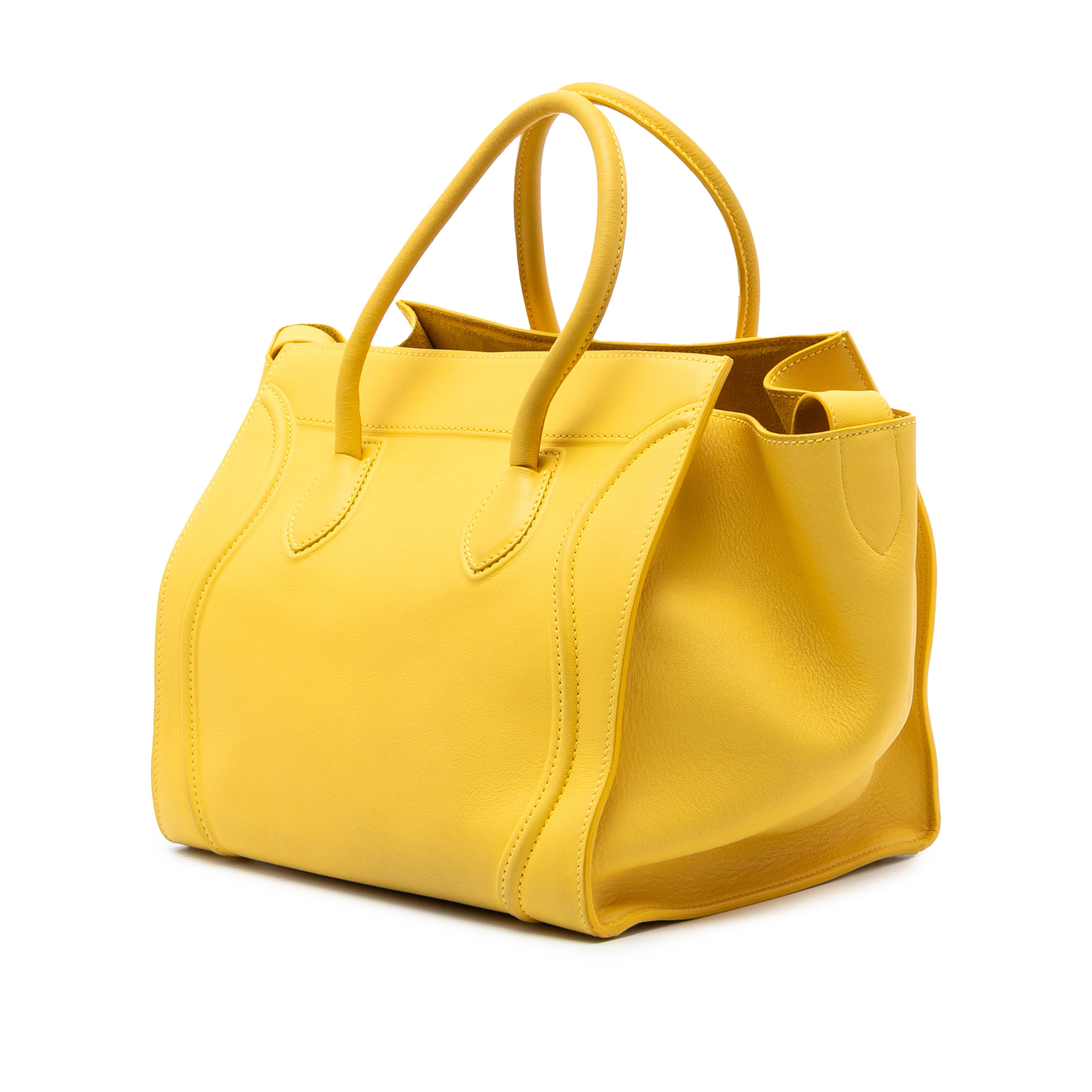 Celine Medium Leather Phantom Luggage Tote, från Luxclusif, i färgen yellow. Klicka för att öppna bilden i stort format