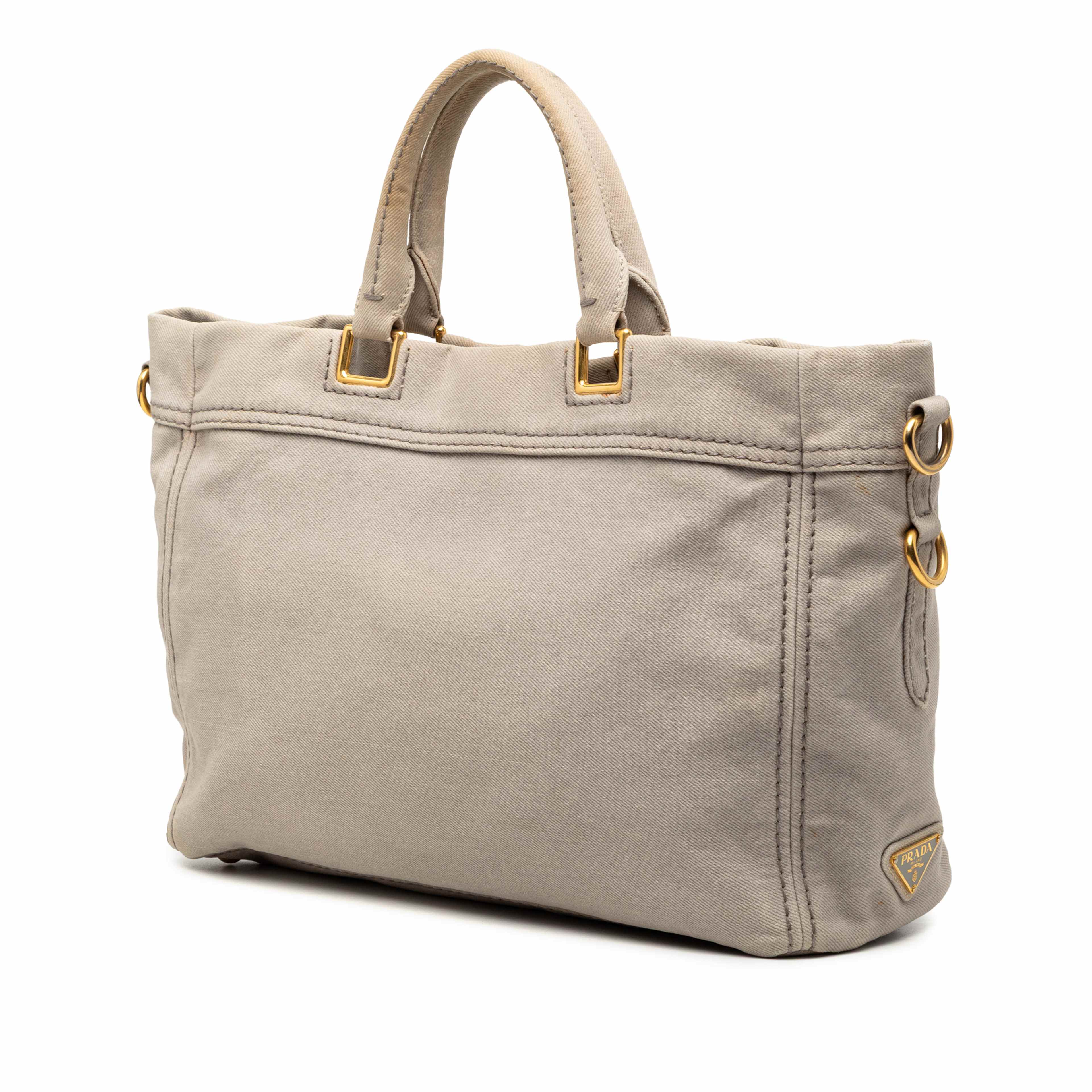 Prada Denim Canapa Logo Satchel, från Luxclusif, i färgen light beige. Klicka för att öppna bilden i stort format