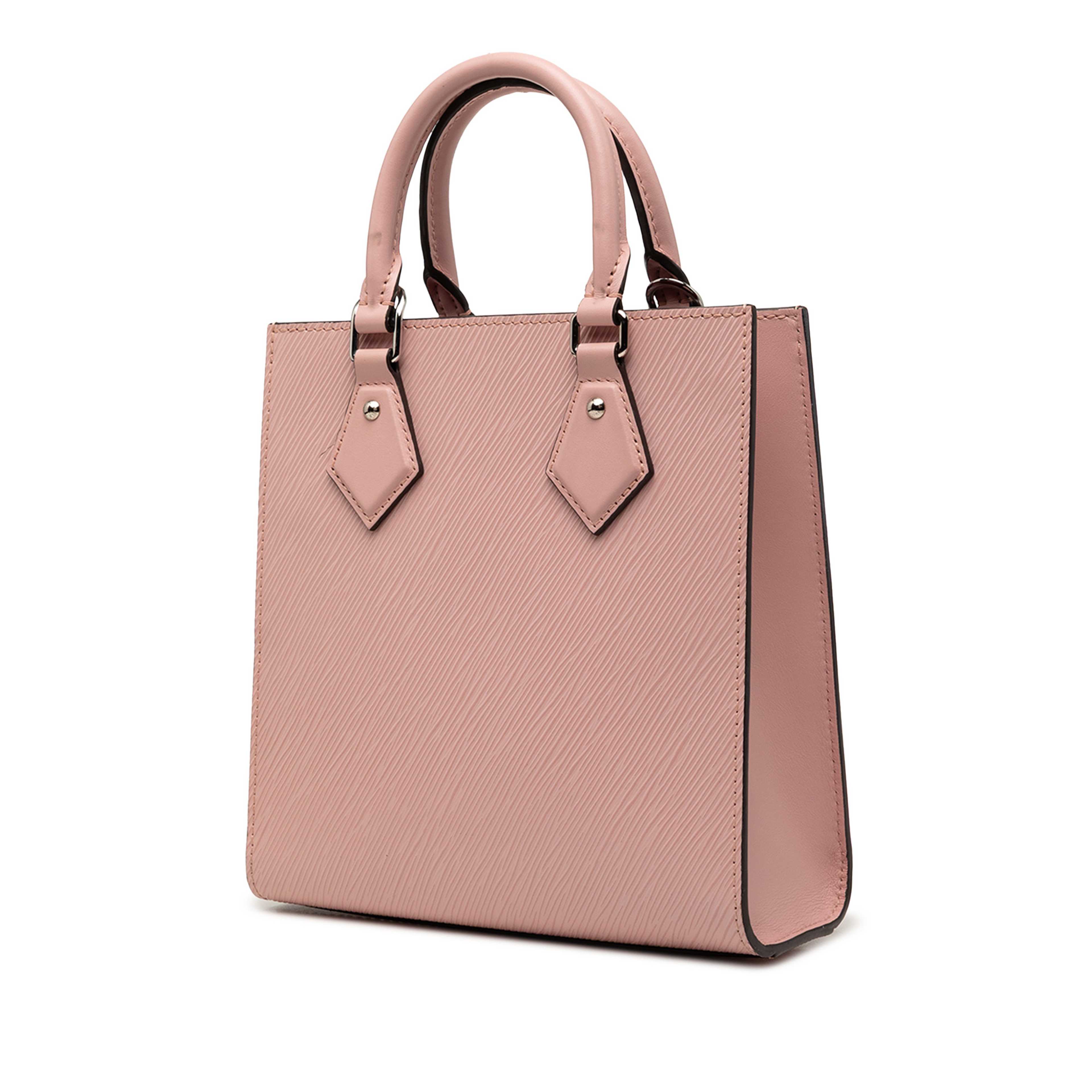 Louis Vuitton Epi Sac Plat Bb, från Luxclusif, i färgen rosa. Klicka för att öppna bilden i stort format