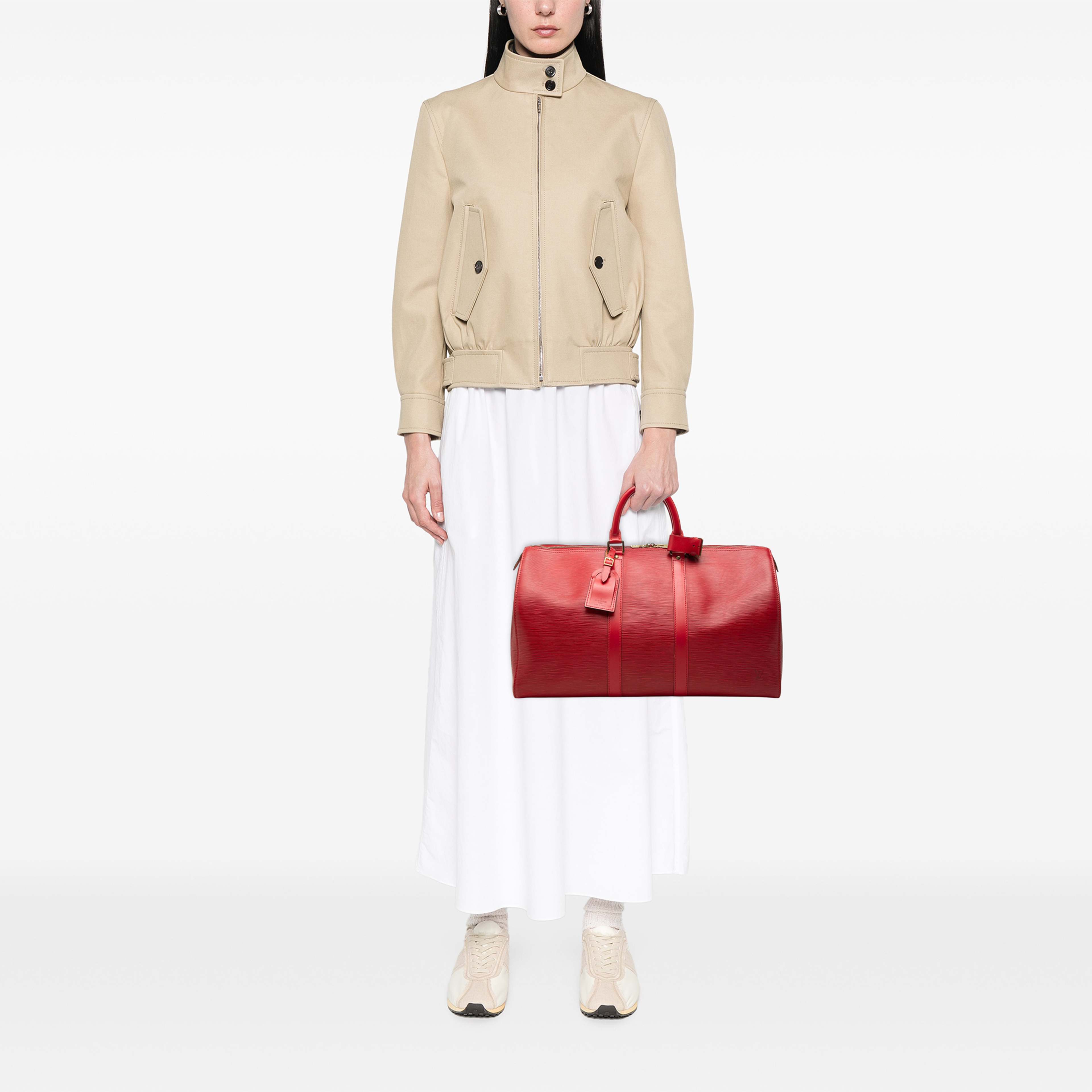 Louis Vuitton Epi Keepall 45, från Luxclusif, i färgen röd. Klicka för att öppna bilden i stort format