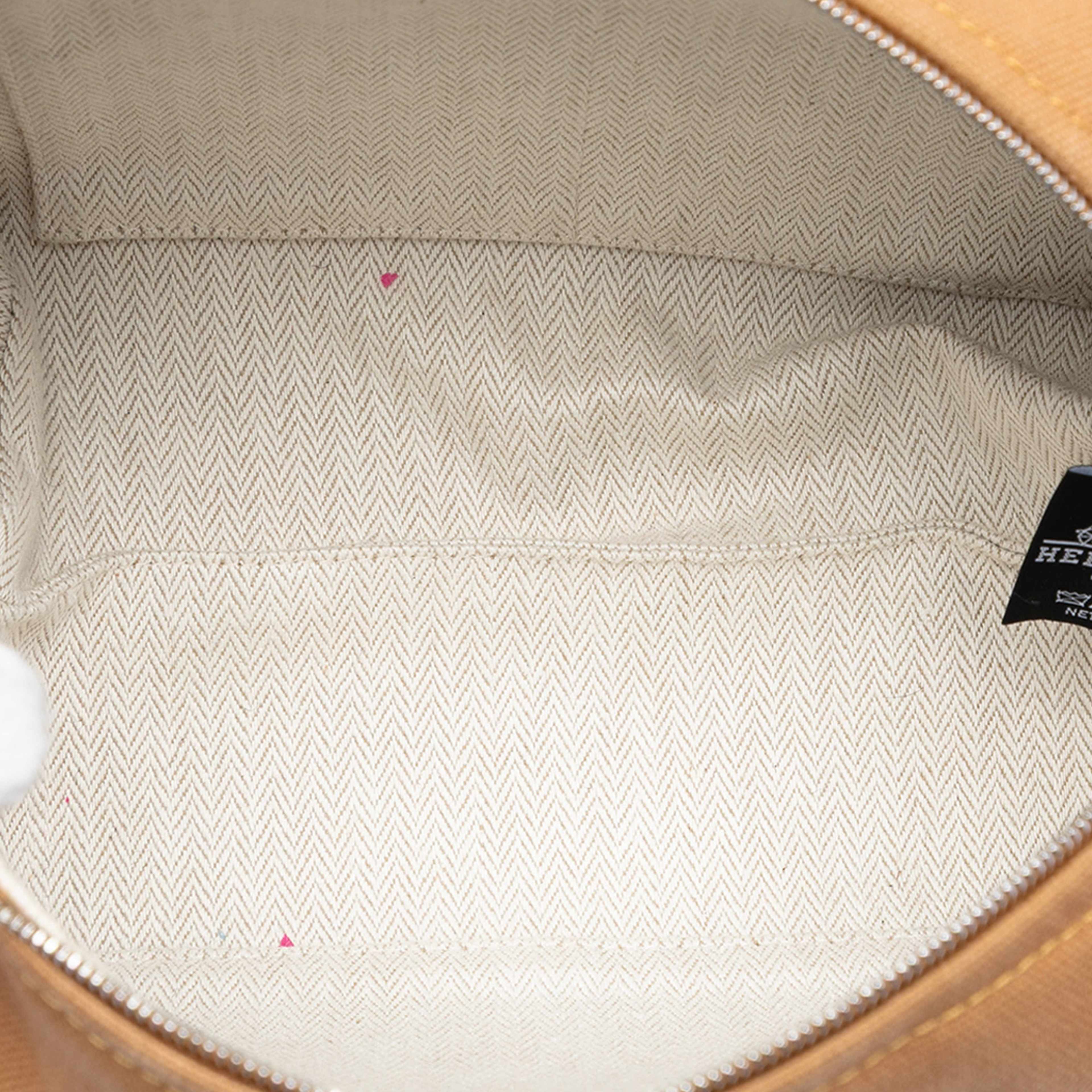 Hermès Small Toile Bride A Brac Case, från Luxclusif, i färgen brown. Klicka för att öppna bilden i stort format