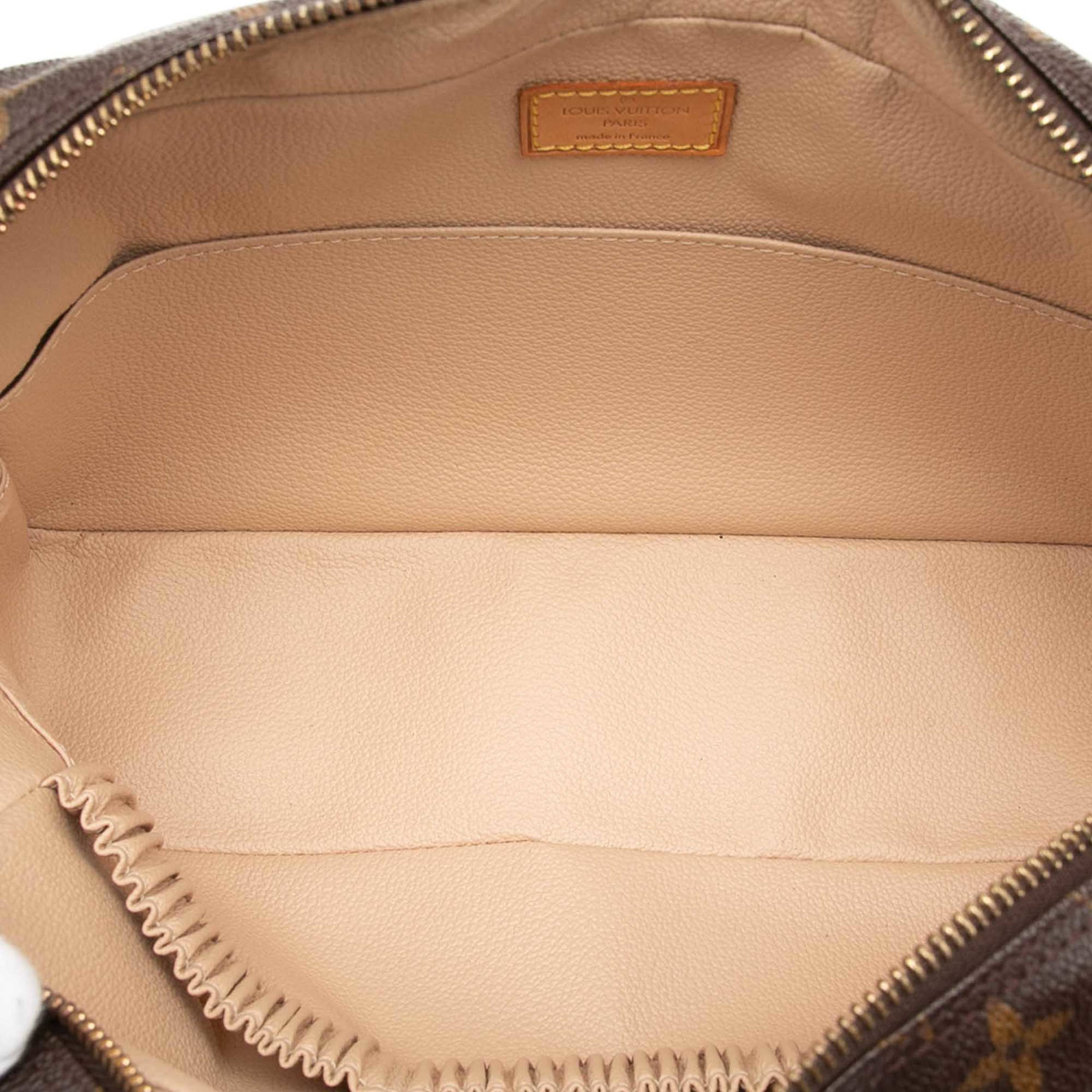 Louis Vuitton Monogram Trousse Toilette 28, från Luxclusif, i färgen brun. Klicka för att öppna bilden i stort format