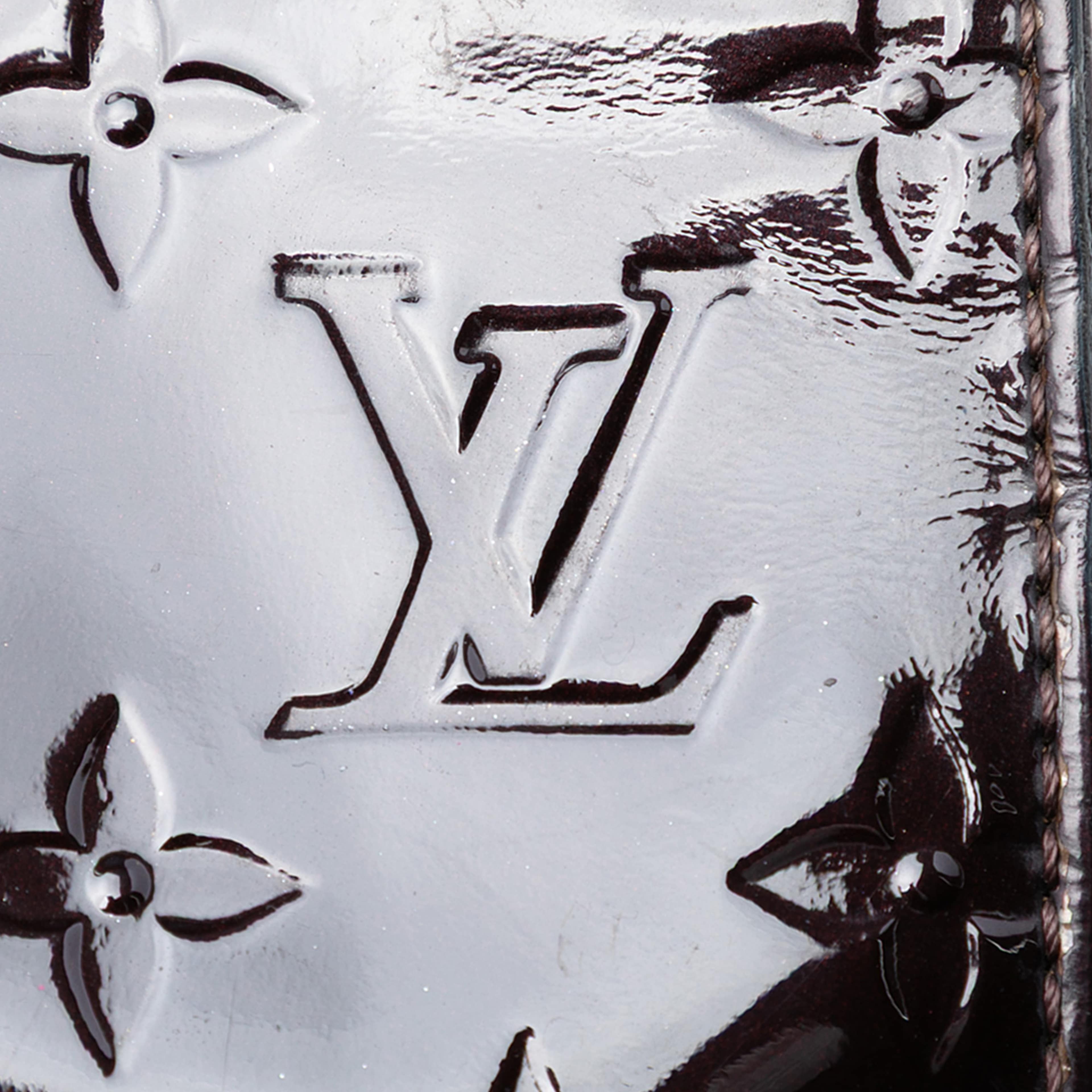 Louis Vuitton Monogram Vernis Neo Triangle, från Luxclusif, i färgen purpur. Klicka för att öppna bilden i stort format