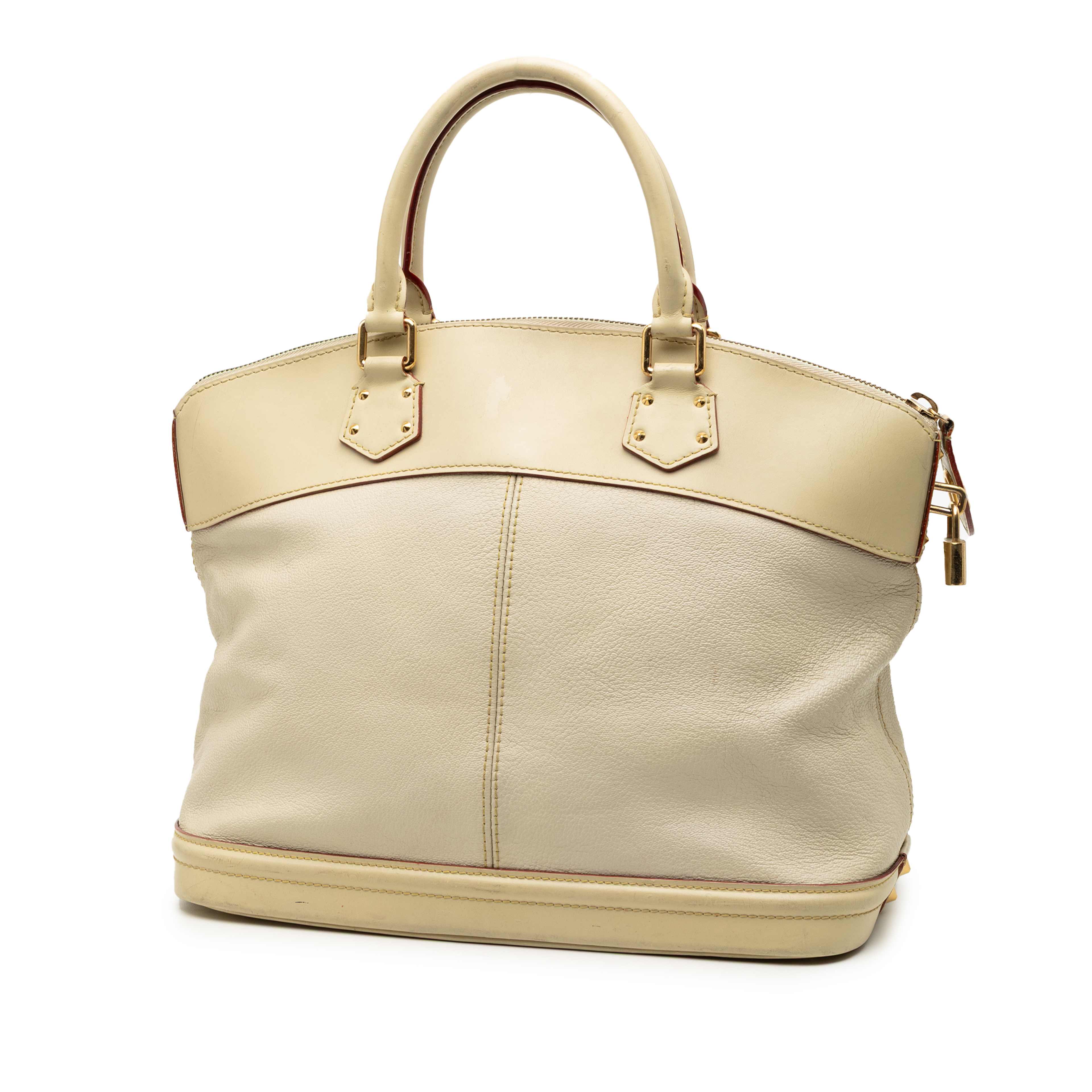 Louis Vuitton Suhali Lockit Mm, från Luxclusif, i färgen beige. Klicka för att öppna bilden i stort format