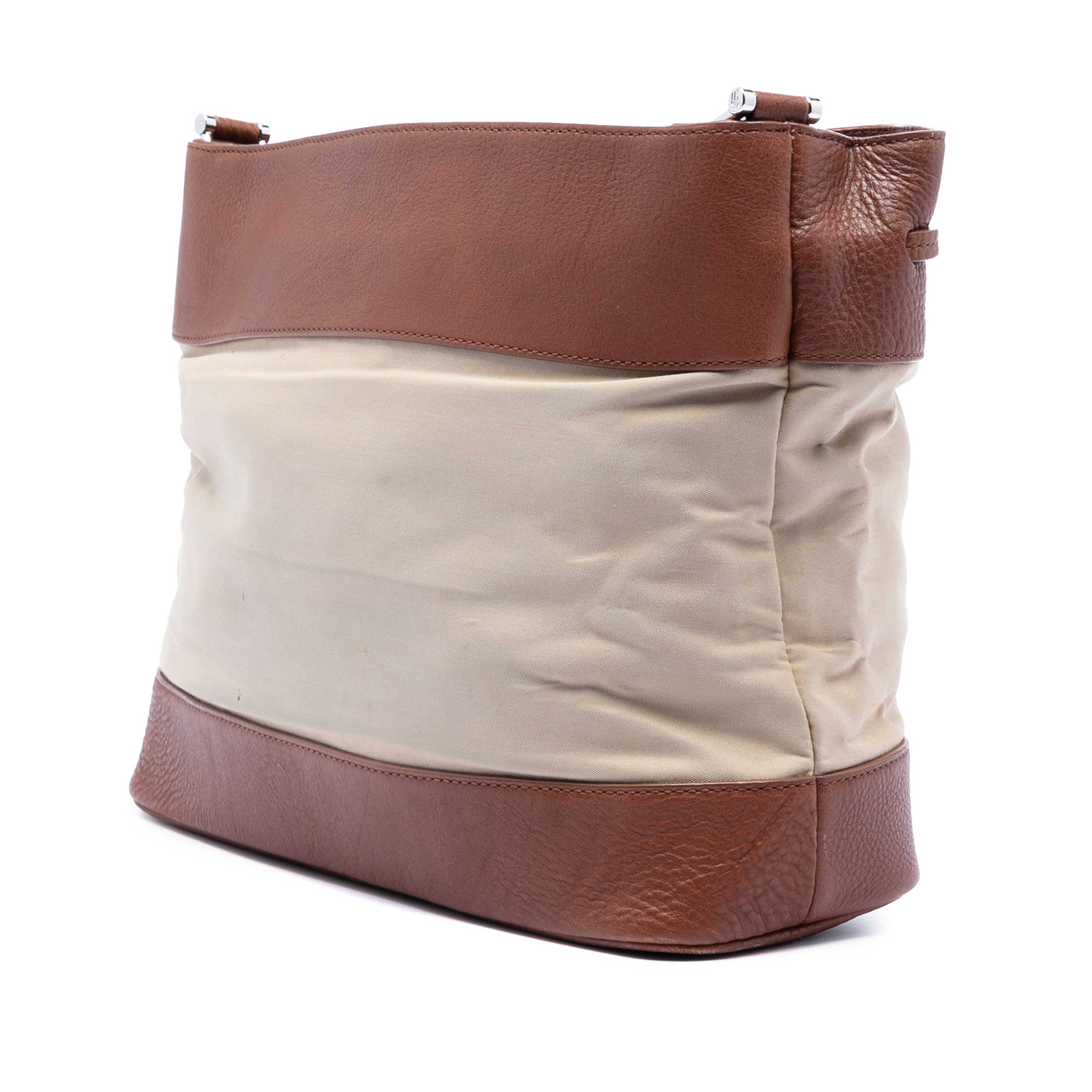 Burberry Leather Trimmed Canvas Drawstring Bucket Bag, från Luxclusif, i färgen brun. Klicka för att öppna bilden i stort format