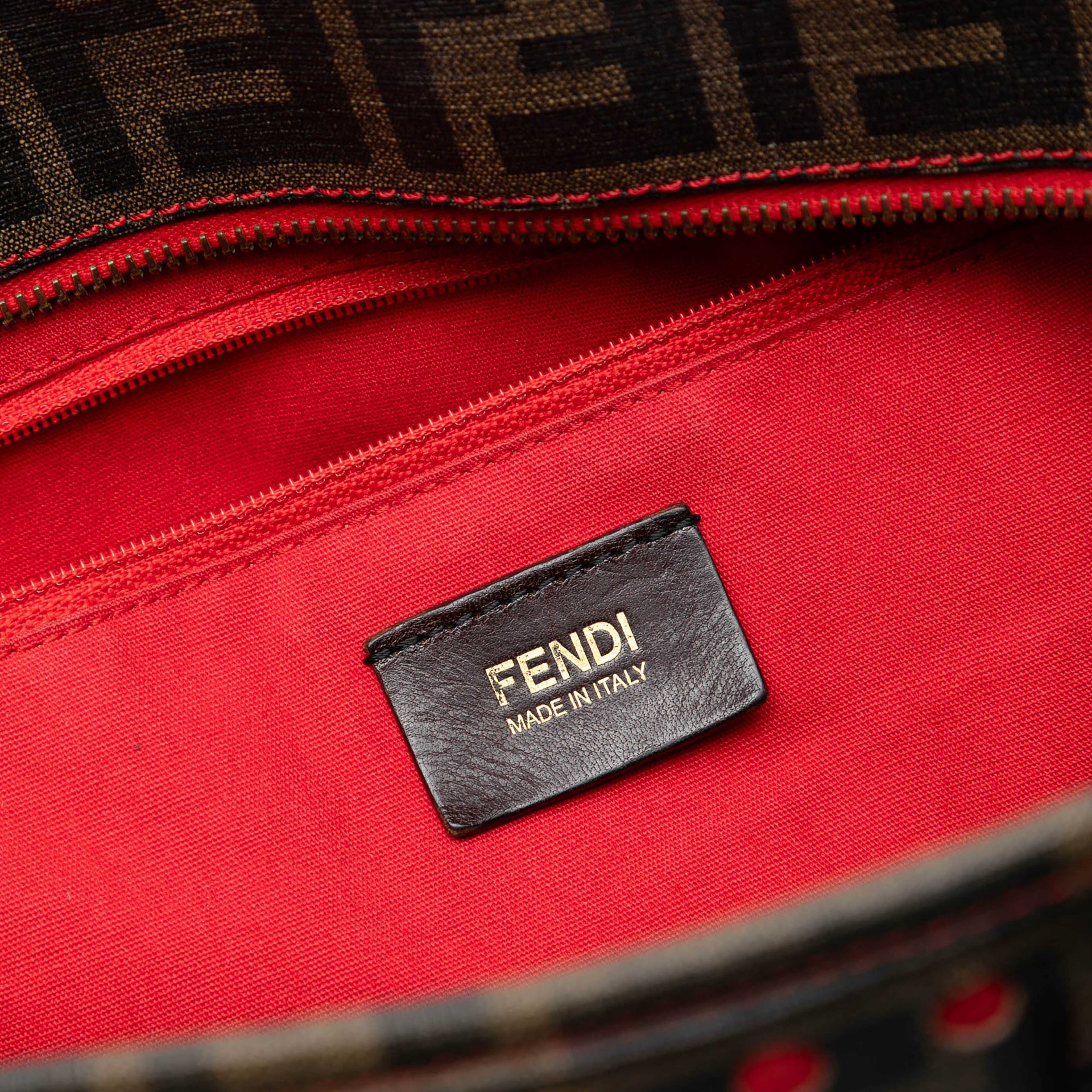 Fendi Medium Zucca Perforated Coated Canvas Roll Tote, från Luxclusif, i färgen brown. Klicka för att öppna bilden i stort format