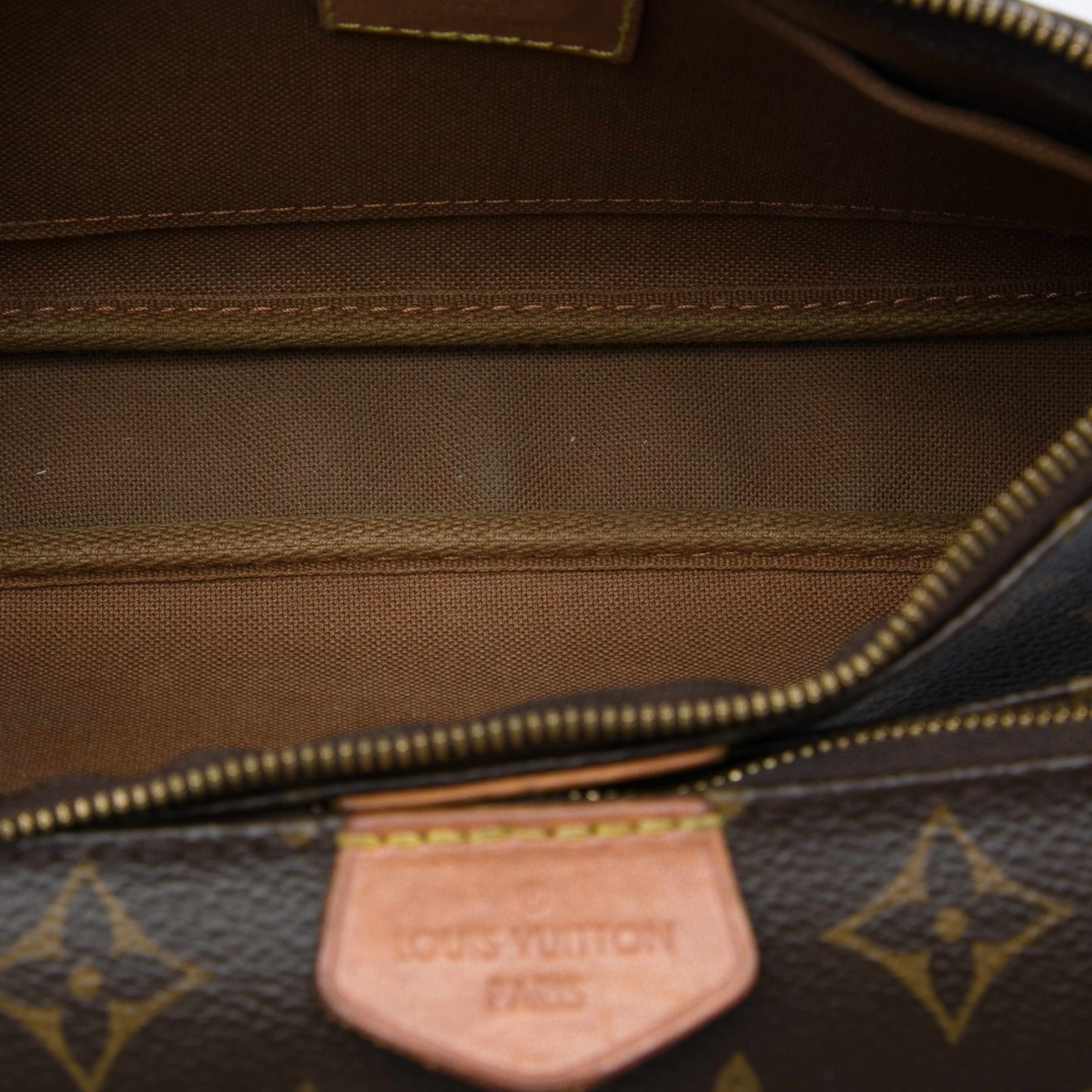 Louis Vuitton Monogram Multi Pochette Accessoires, från Luxclusif, i färgen brun. Klicka för att öppna bilden i stort format