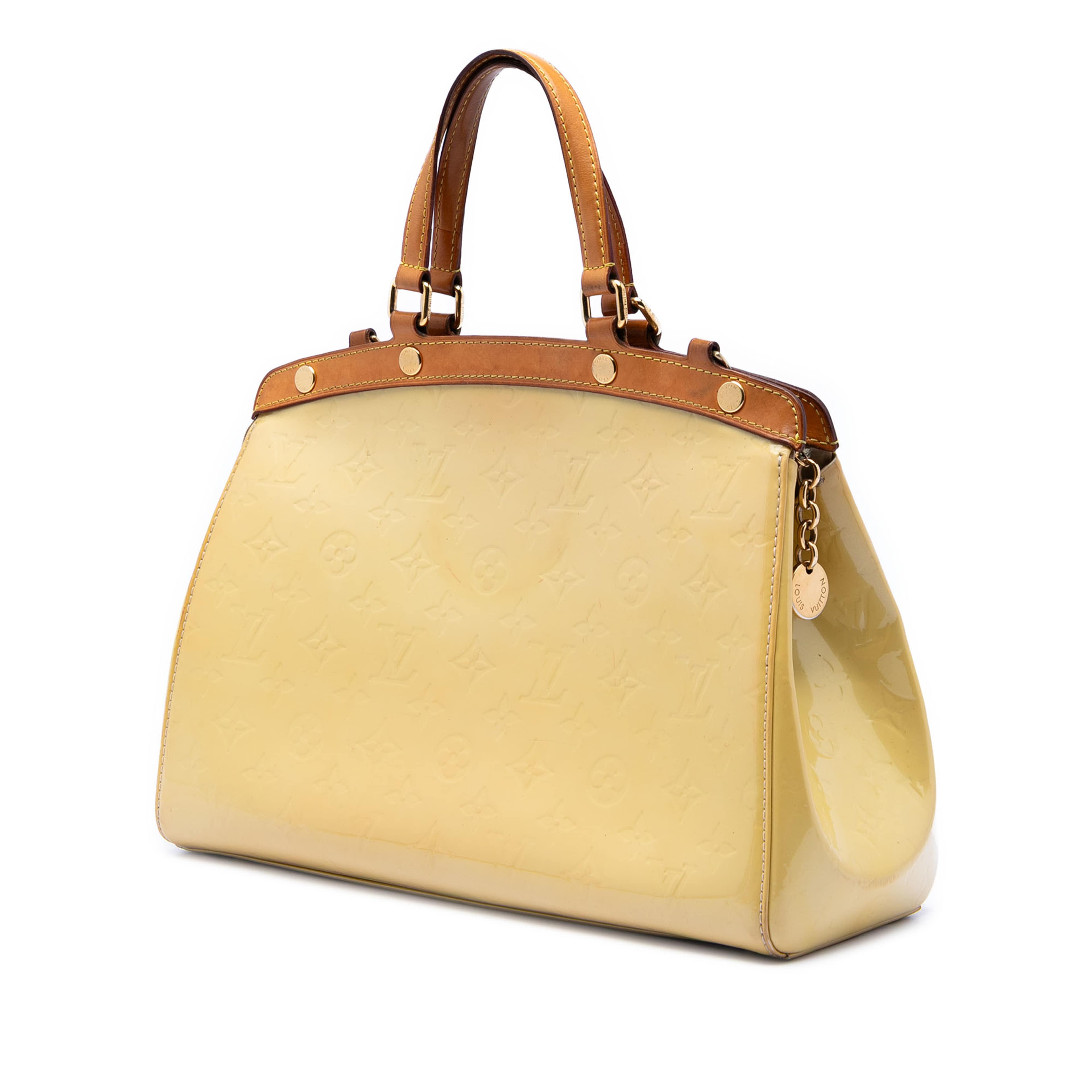 Louis Vuitton Monogram Vernis Brea Mm, från Luxclusif, i färgen gul. Klicka för att öppna bilden i stort format
