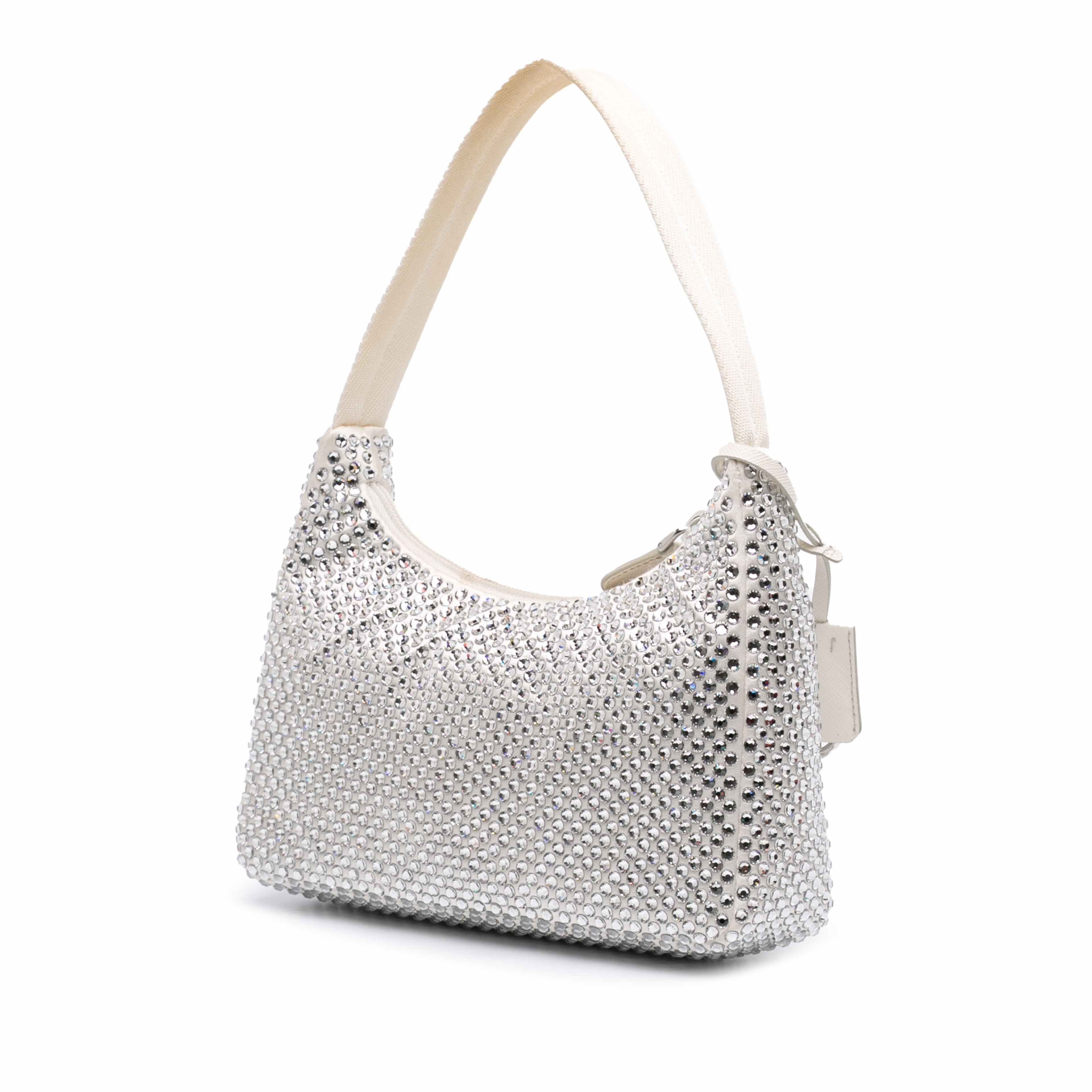 Prada Mini Satin Crystal Re-edition 2000 Shoulder Bag, från Luxclusif, i färgen white. Klicka för att öppna bilden i stort format