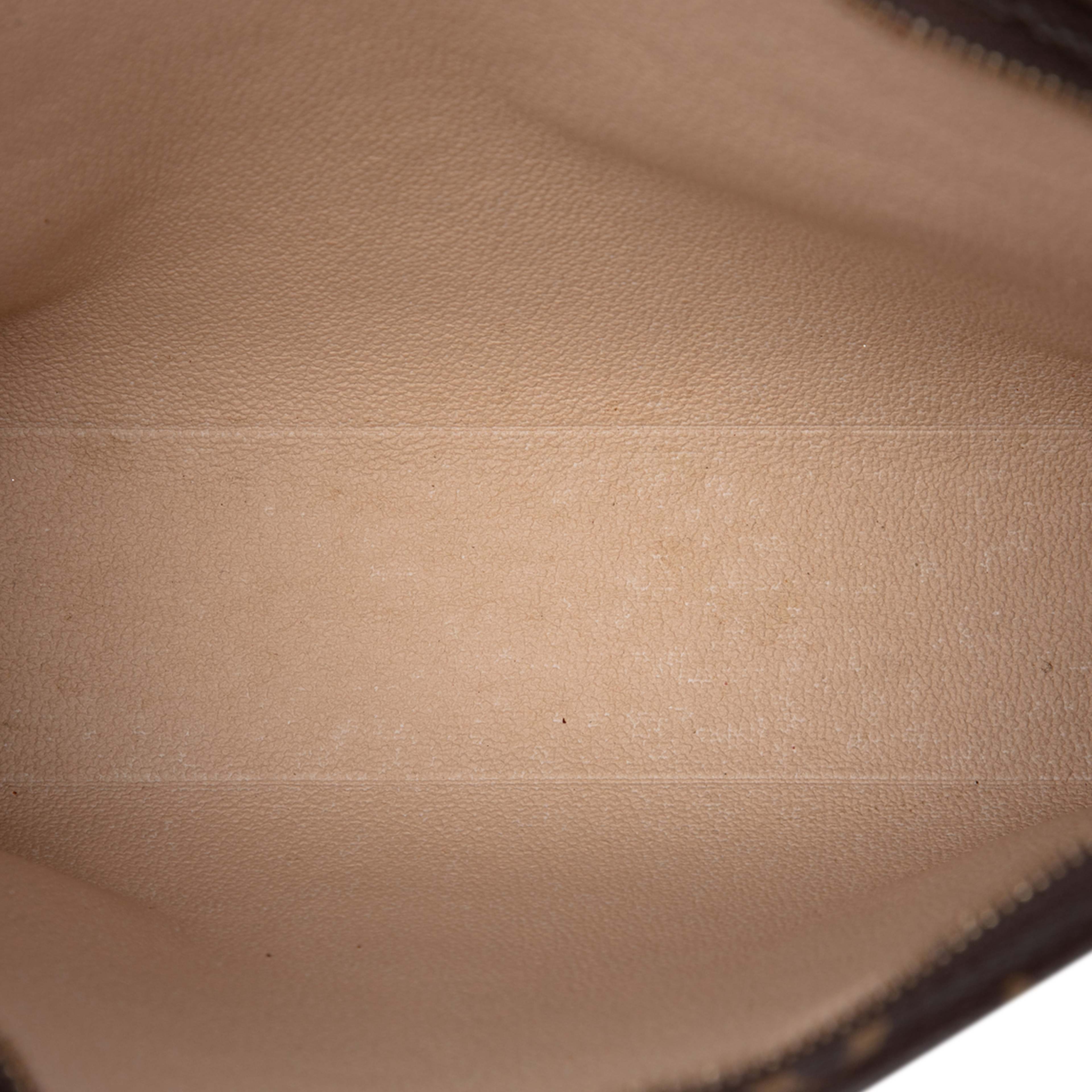 Louis Vuitton Monogram Toiletry Pouch 26, från Luxclusif, i färgen brun. Klicka för att öppna bilden i stort format