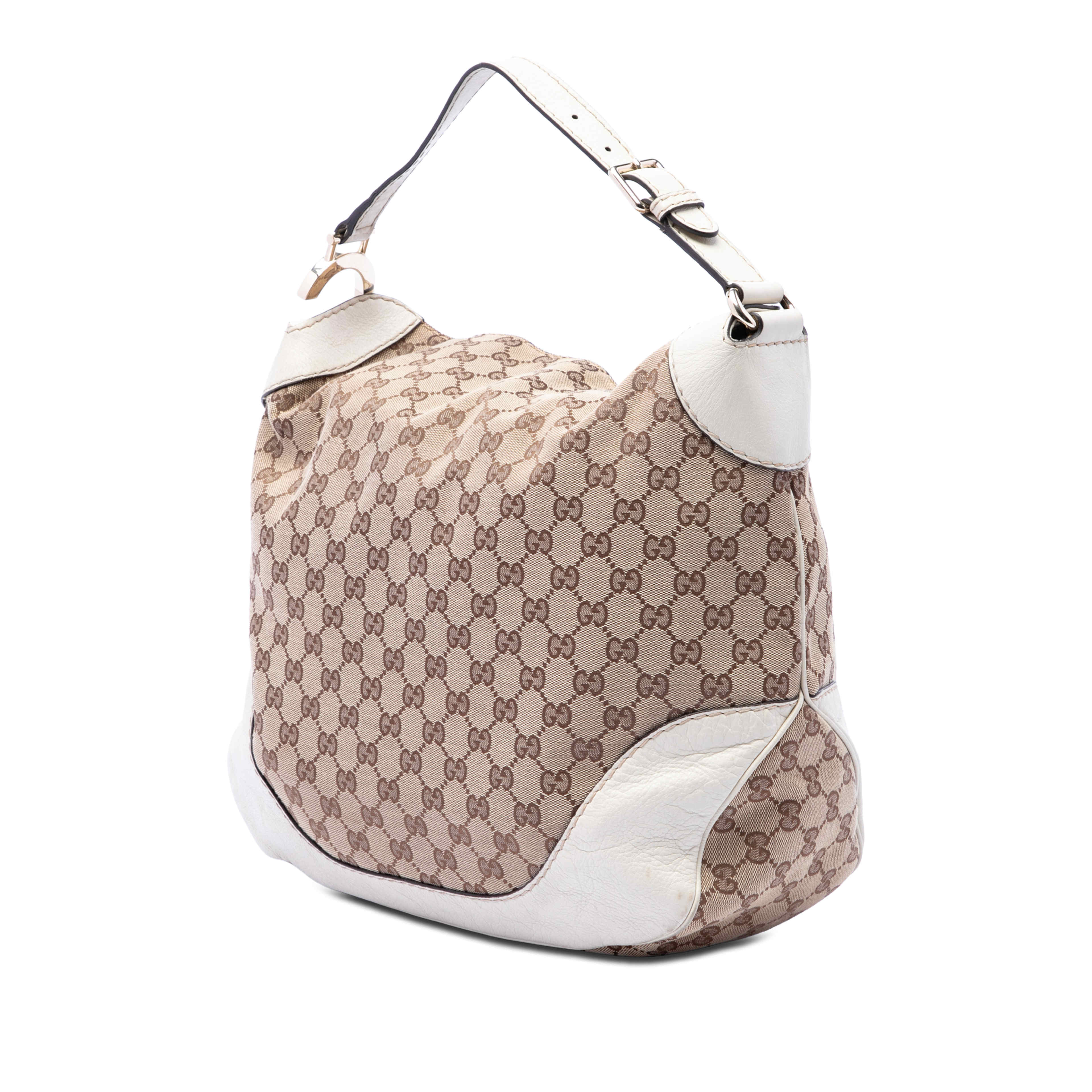 Gucci Gg Canvas Charlotte Hobo, från Luxclusif, i färgen vit. Klicka för att öppna bilden i stort format