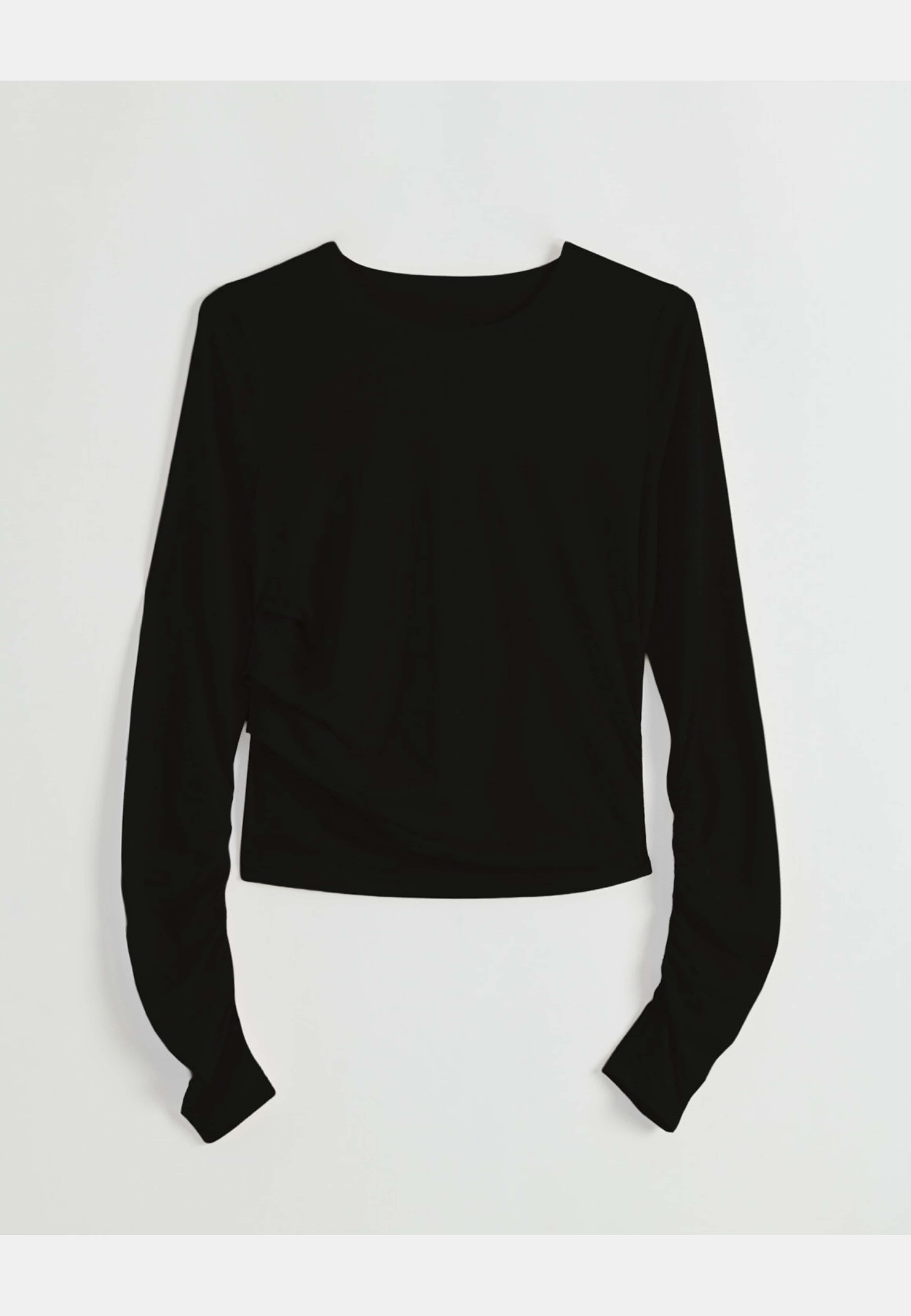 Luminous Draped Long Sleeve, från aim'n, i färgen black. Klicka för att öppna bilden i stort format