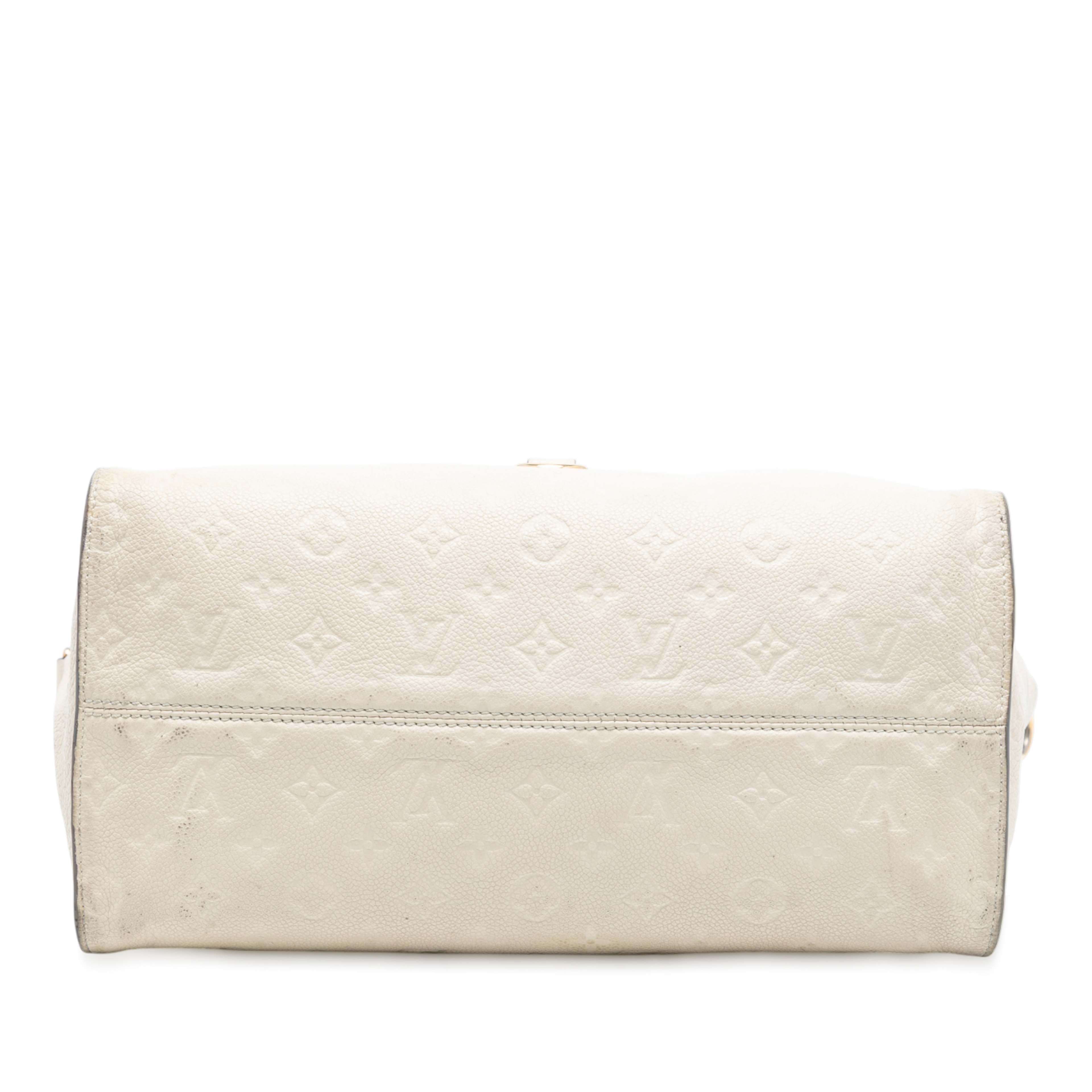 Louis Vuitton Monogram Empreinte Lumineuse Pm, från Luxclusif, i färgen beige. Klicka för att öppna bilden i stort format