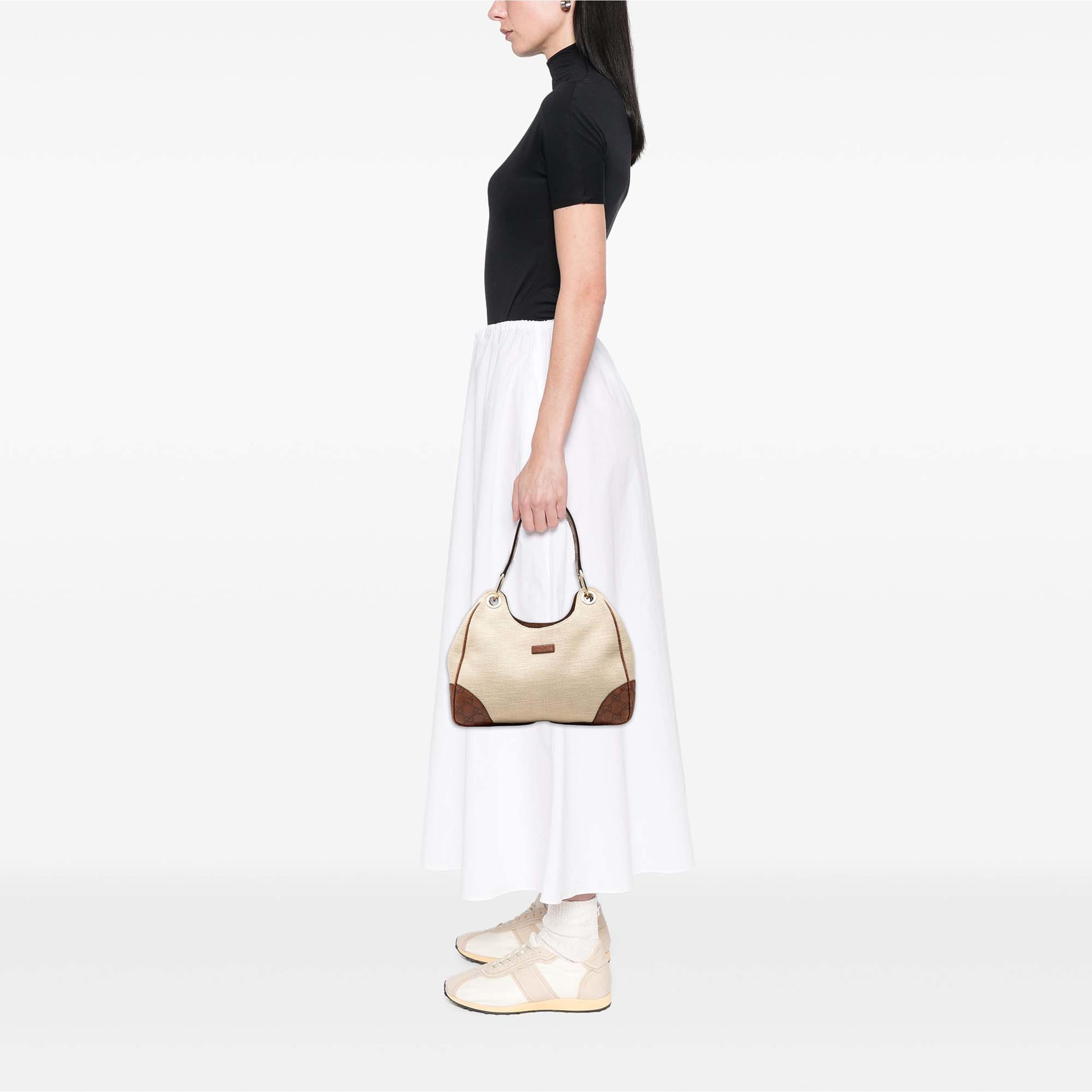 Gucci Guccissima Trimmed Canvas Colbert Shoulder Bag, från Luxclusif, i färgen brun. Klicka för att öppna bilden i stort format