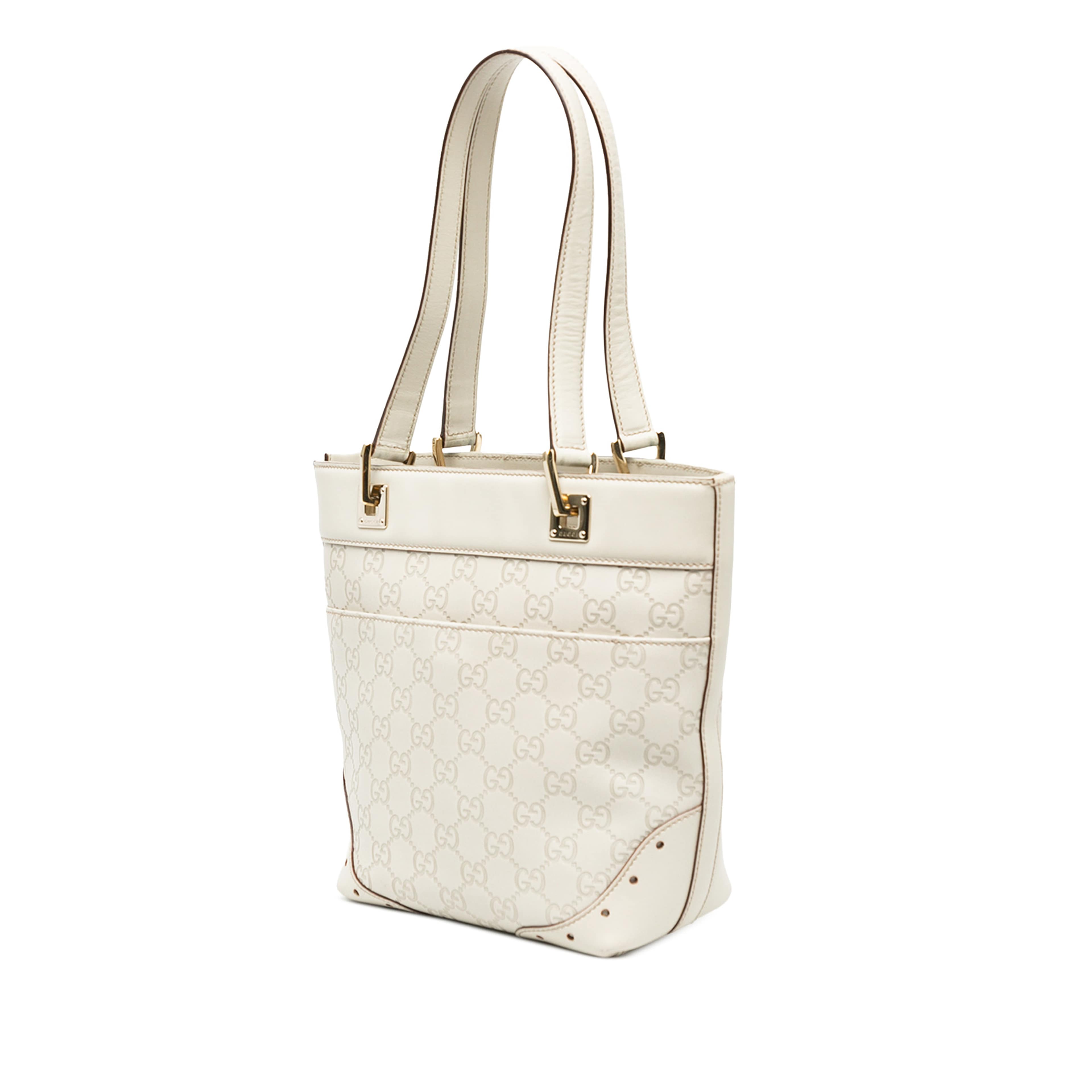 Gucci Mini Guccissima Punch Tote, från Luxclusif, i färgen vit. Klicka för att öppna bilden i stort format