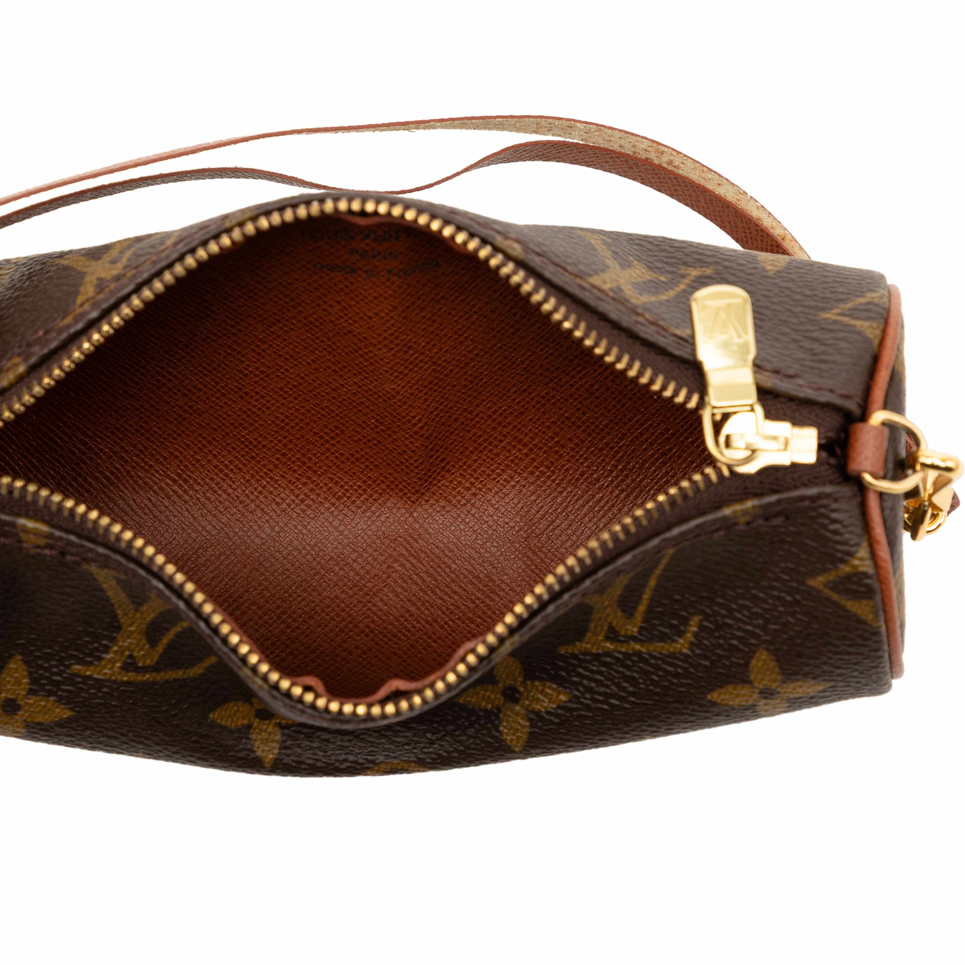 Louis Vuitton Monogram Papillon Pochette, från Luxclusif, i färgen brun. Klicka för att öppna bilden i stort format