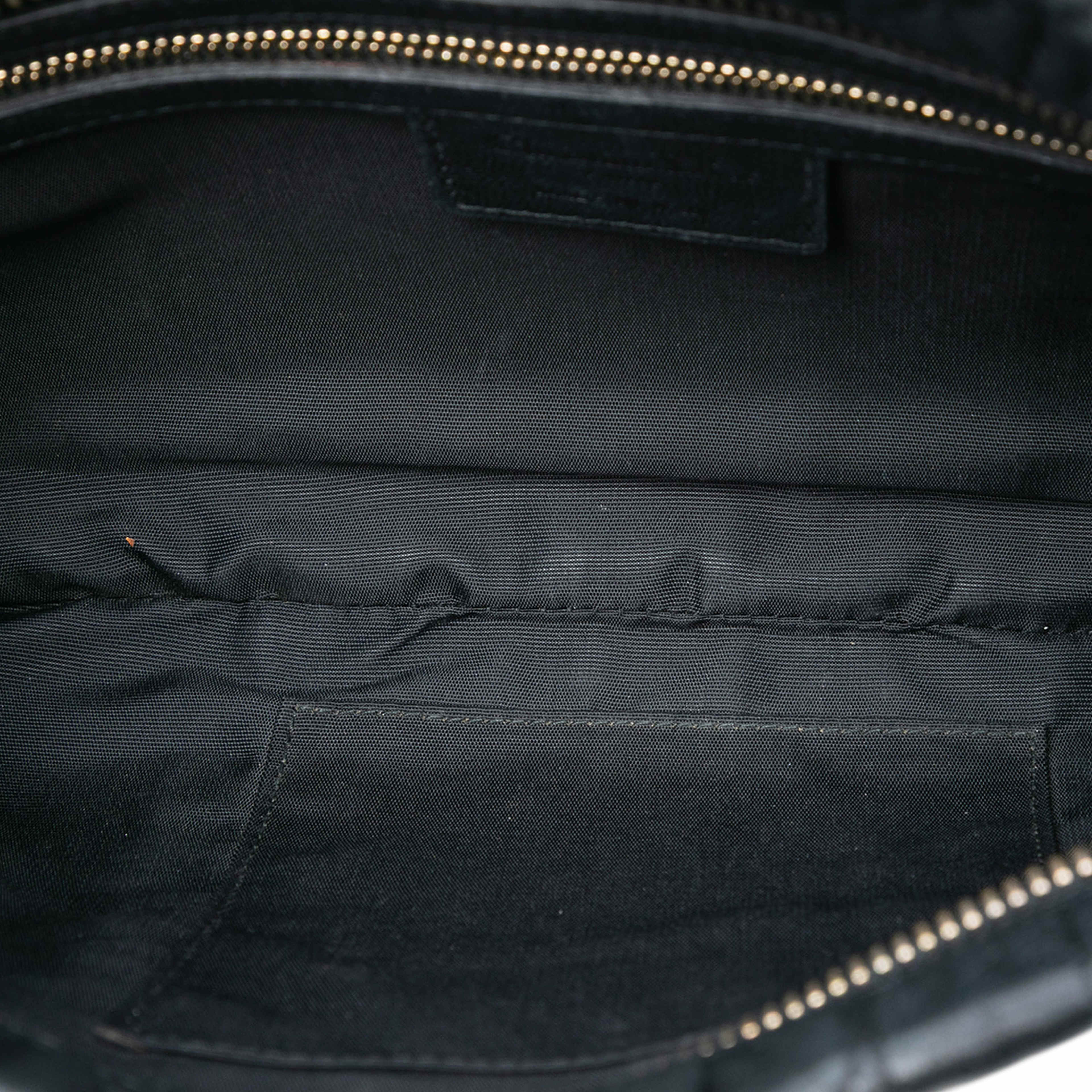 Dior Calfskin Cannage Rose Clutch, från Luxclusif, i färgen black. Klicka för att öppna bilden i stort format