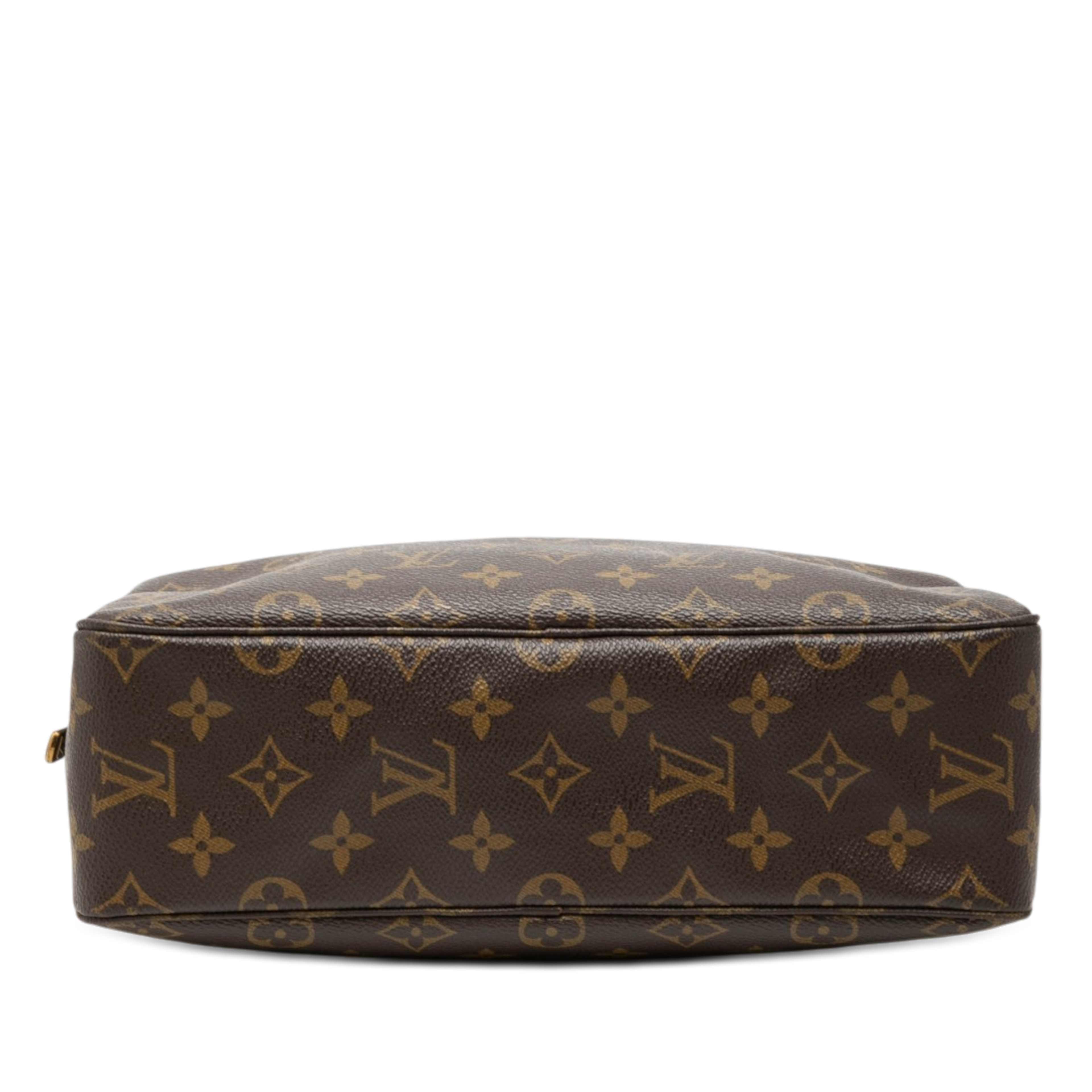 Louis Vuitton Monogram Trousse Toilette 28, från Luxclusif, i färgen brun. Klicka för att öppna bilden i stort format