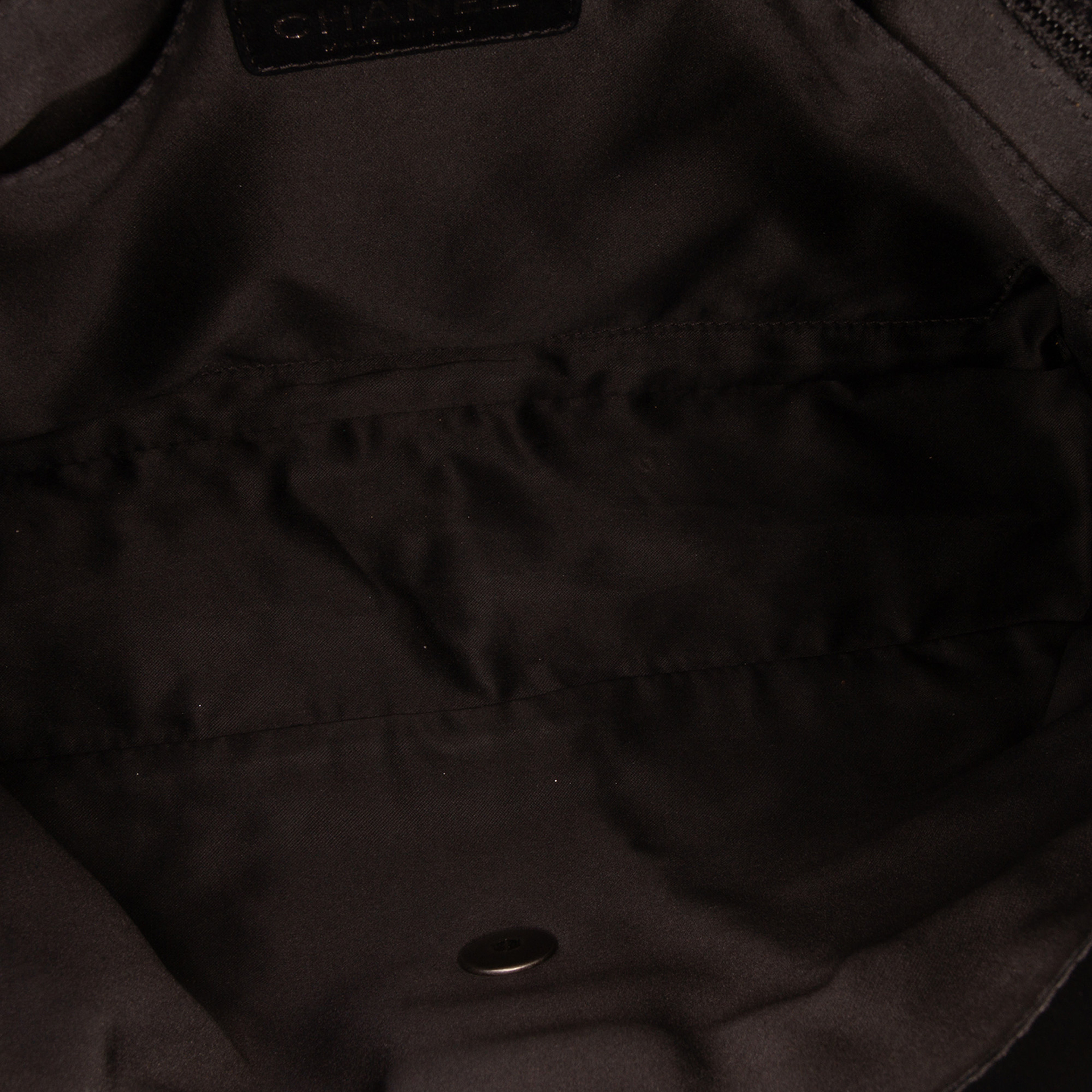 Chanel Jumbo Patchwork Tweed Flap, från Luxclusif, i färgen black. Klicka för att öppna bilden i stort format