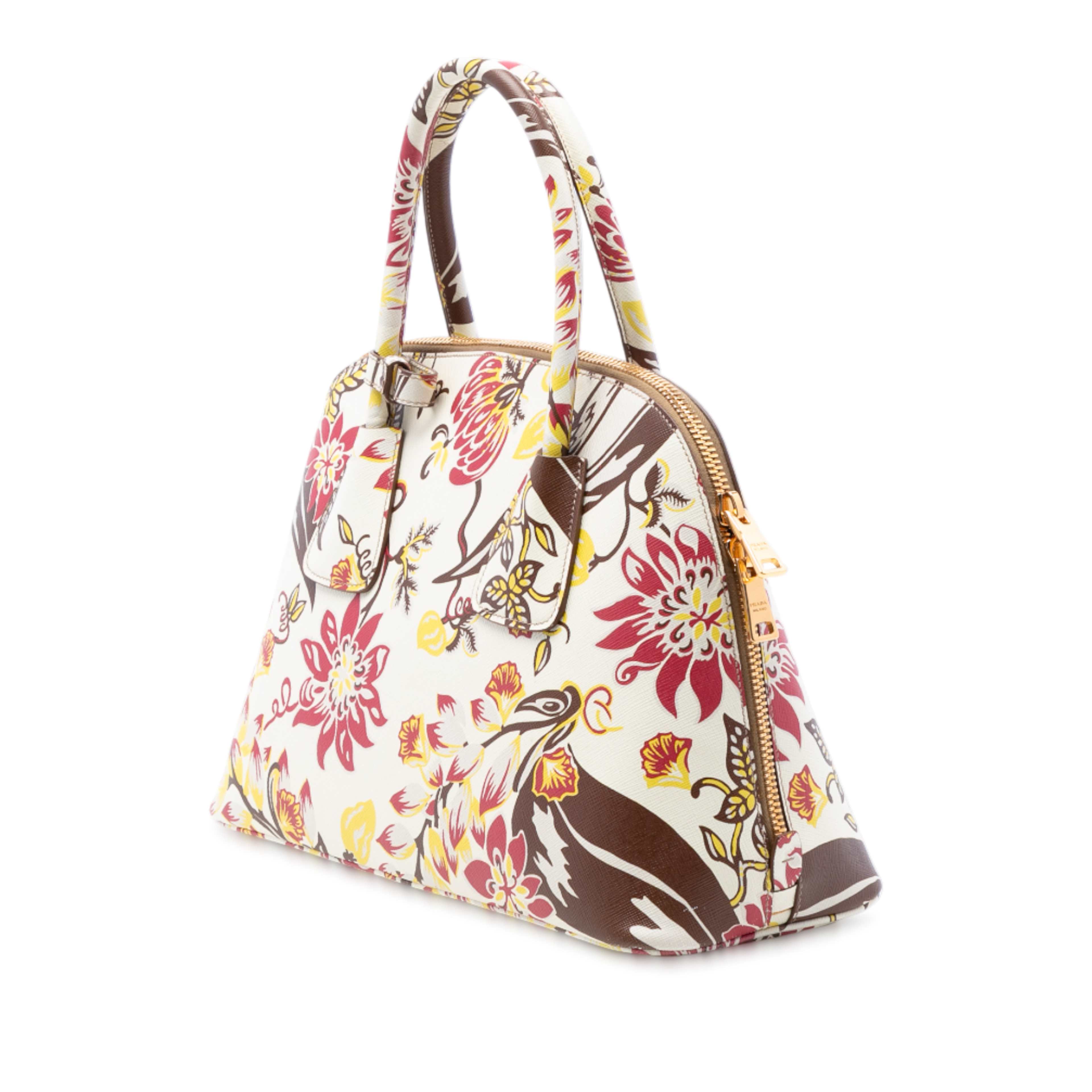 Prada Large Saffiano Lux Floral Print Promenade Front Pocket Satchel, från Luxclusif, i färgen white. Klicka för att öppna bilden i stort format