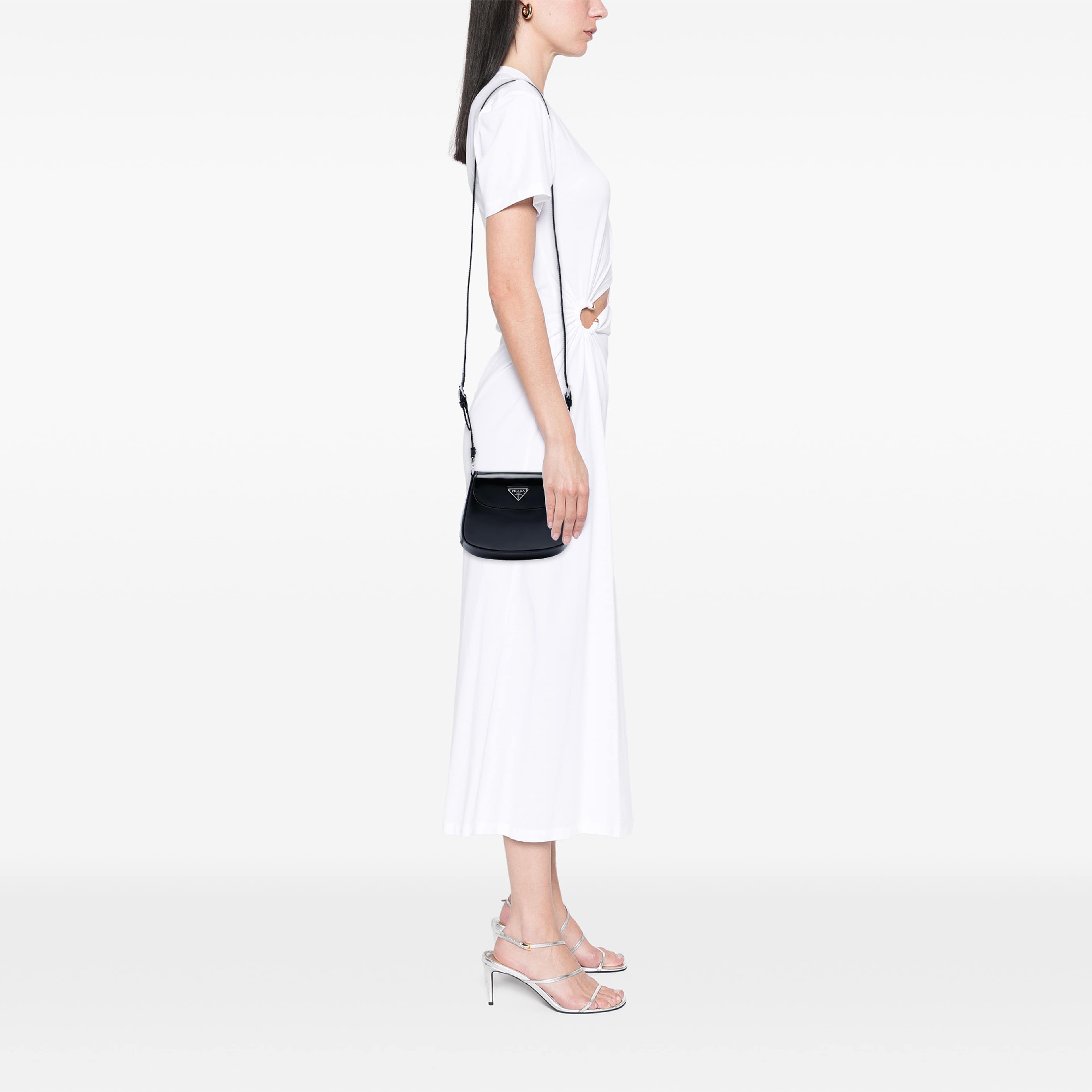 Prada Mini Brushed Leather Cleo Flap, från Luxclusif, i färgen svart. Klicka för att öppna bilden i stort format
