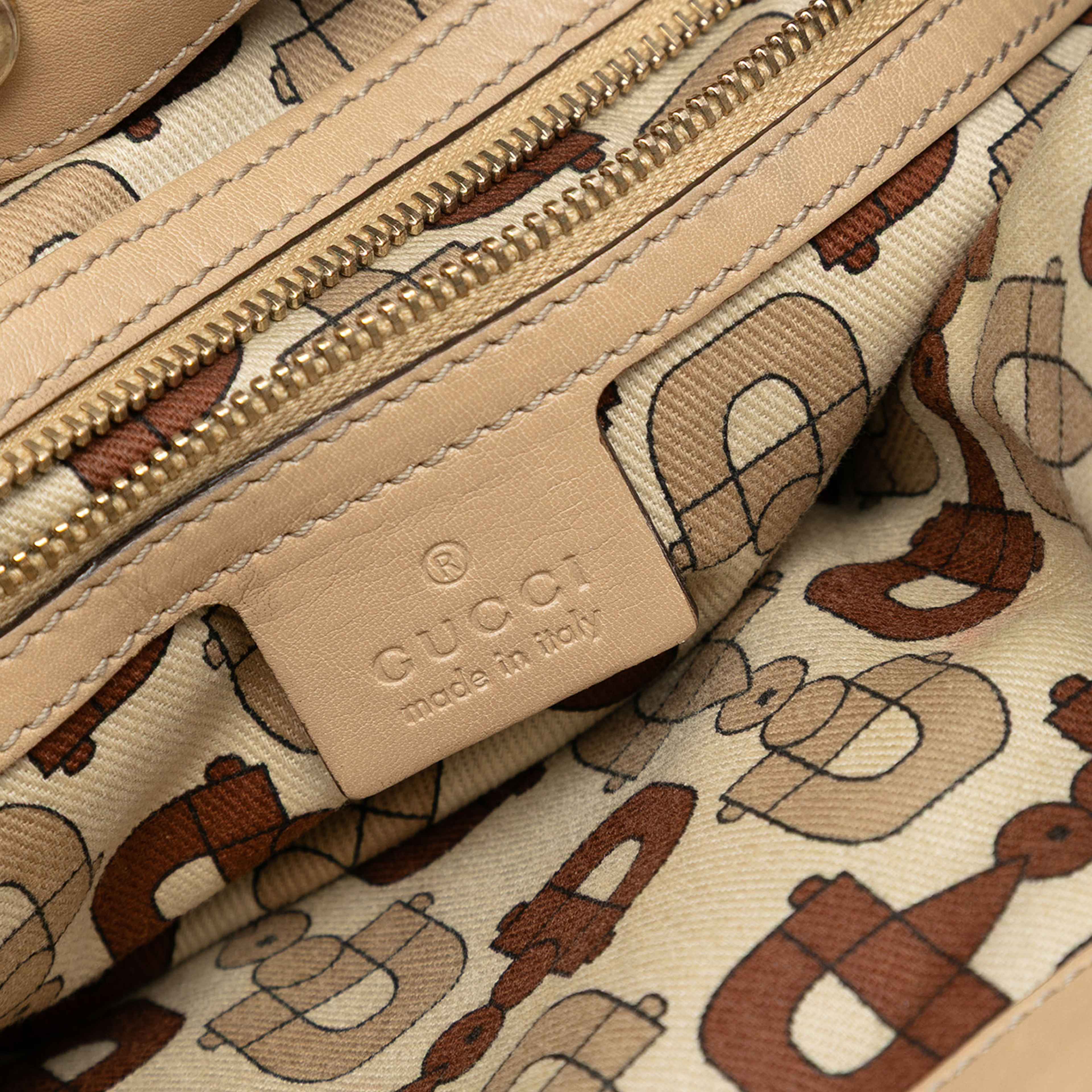 Gucci Medium Guccissima Web Britt Satchel, från Luxclusif, i färgen beige. Klicka för att öppna bilden i stort format