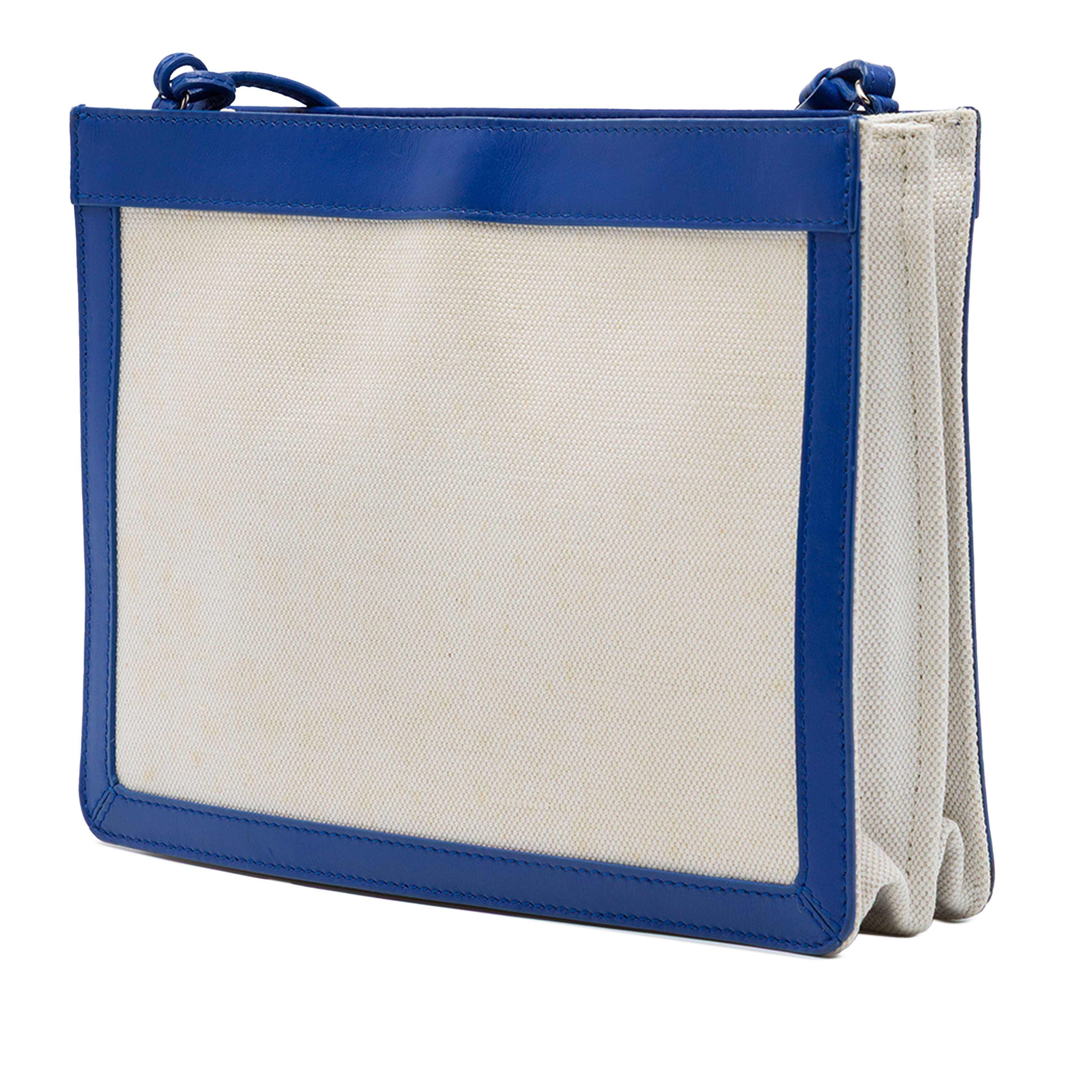 Balenciaga Canvas Navy Pochette Crossbody, från Luxclusif, i färgen brun. Klicka för att öppna bilden i stort format