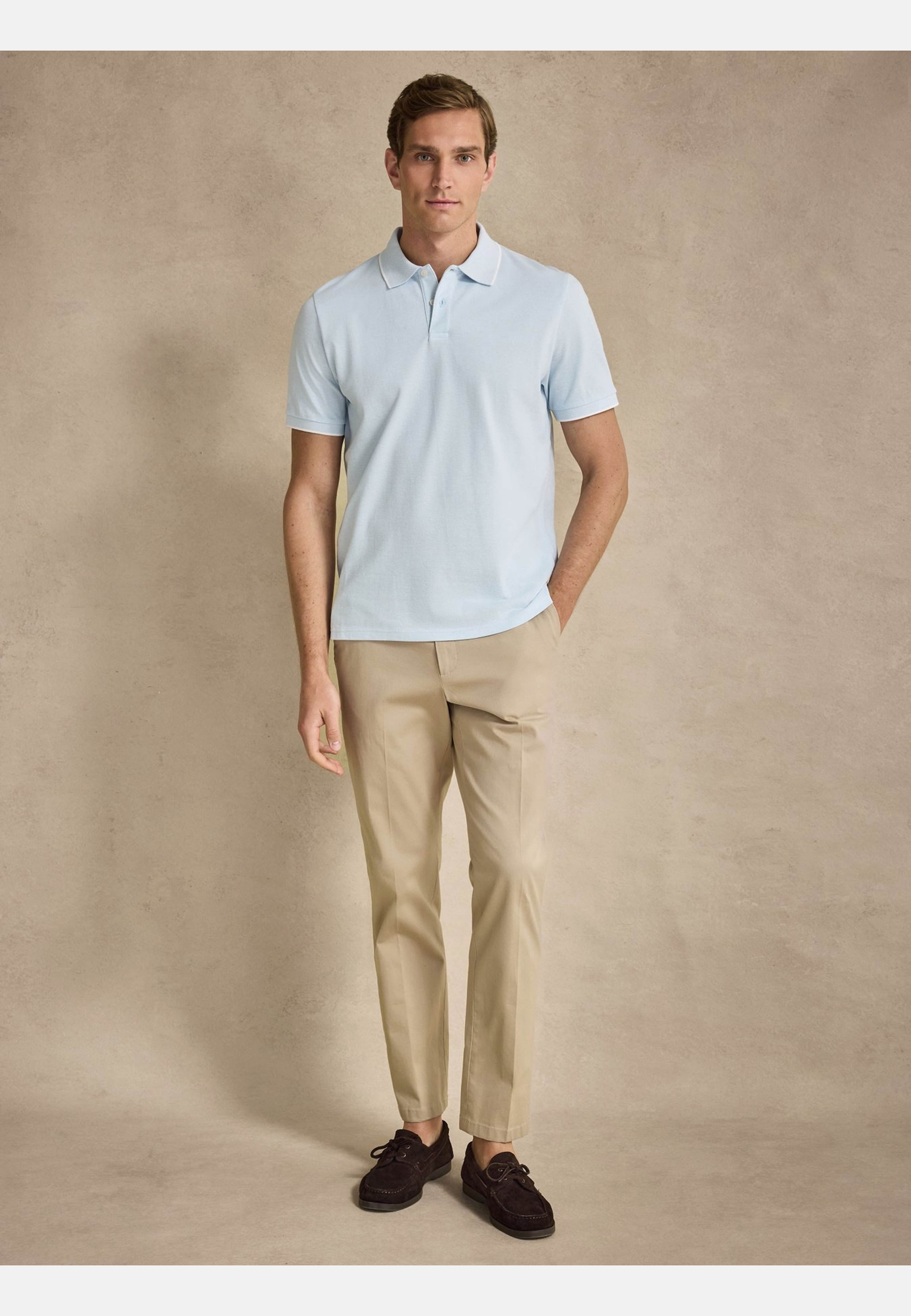 Cotton S/s Jersey Polo (ove), från John Henric, i färgen light blue. Klicka för att öppna bilden i stort format