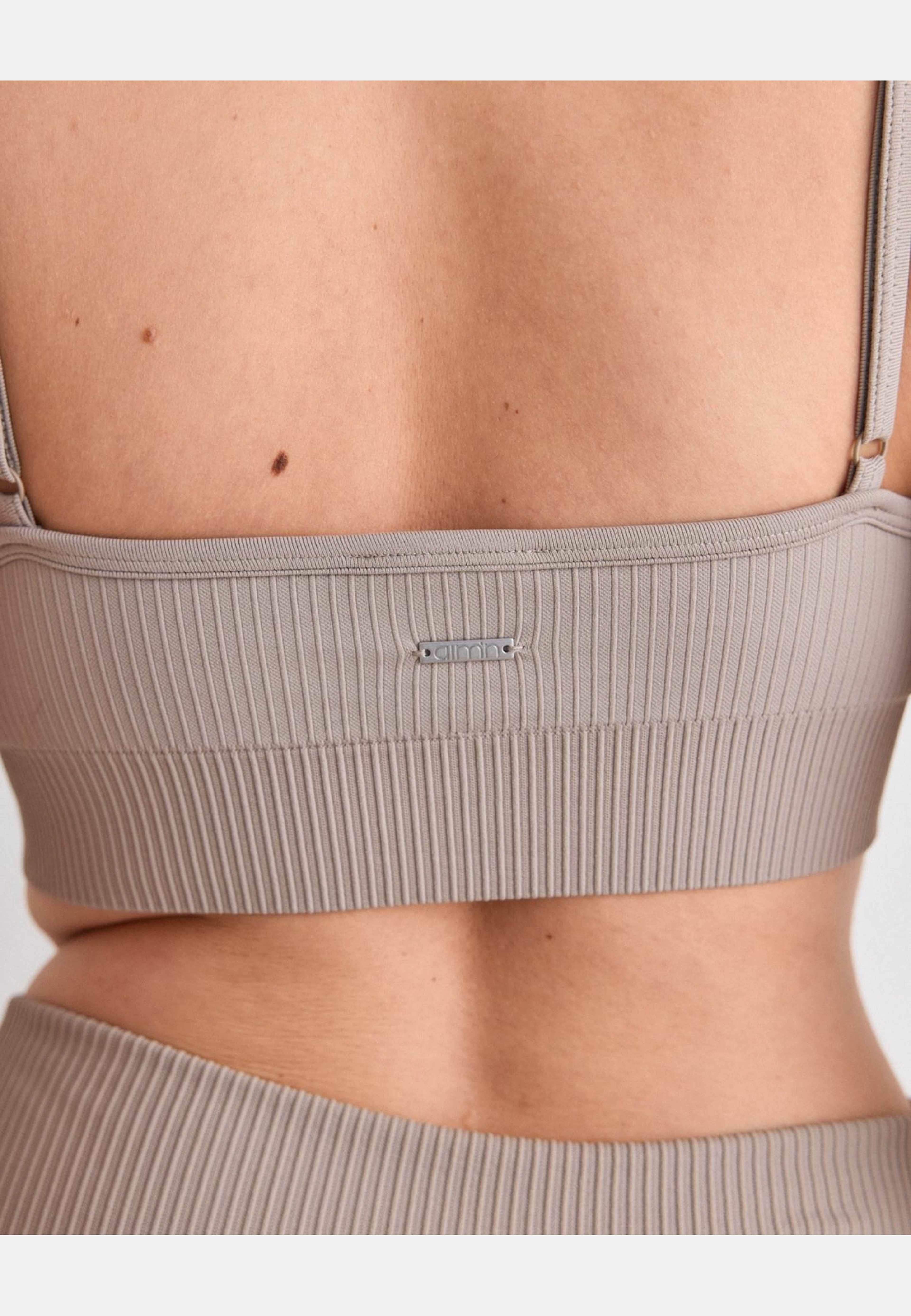 Ribbed Seamless Deep Cut Bra, från aim'n, i färgen dark clay. Klicka för att öppna bilden i stort format