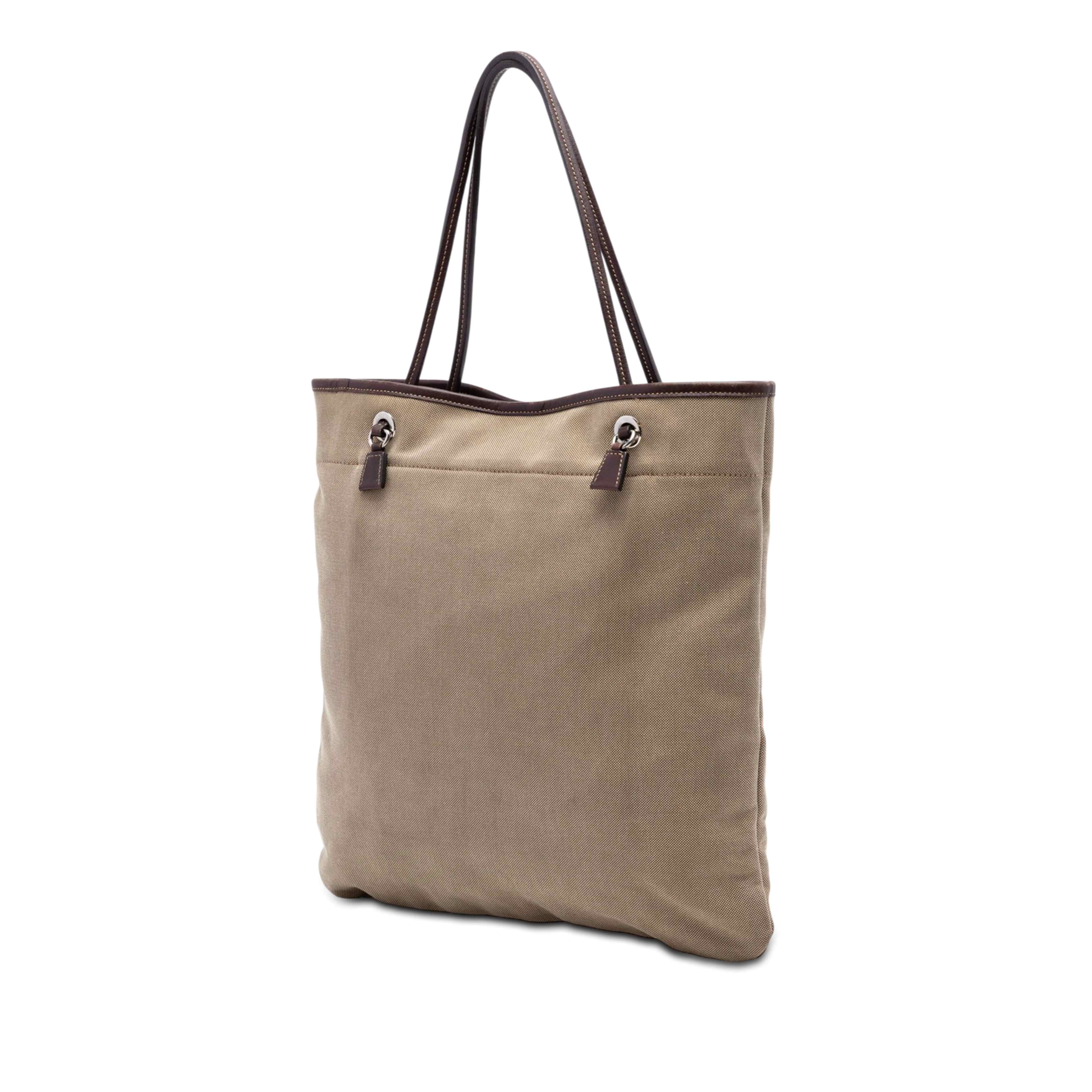 Prada Canvas Canapa Logo Tote, från Luxclusif, i färgen light brown. Klicka för att öppna bilden i stort format